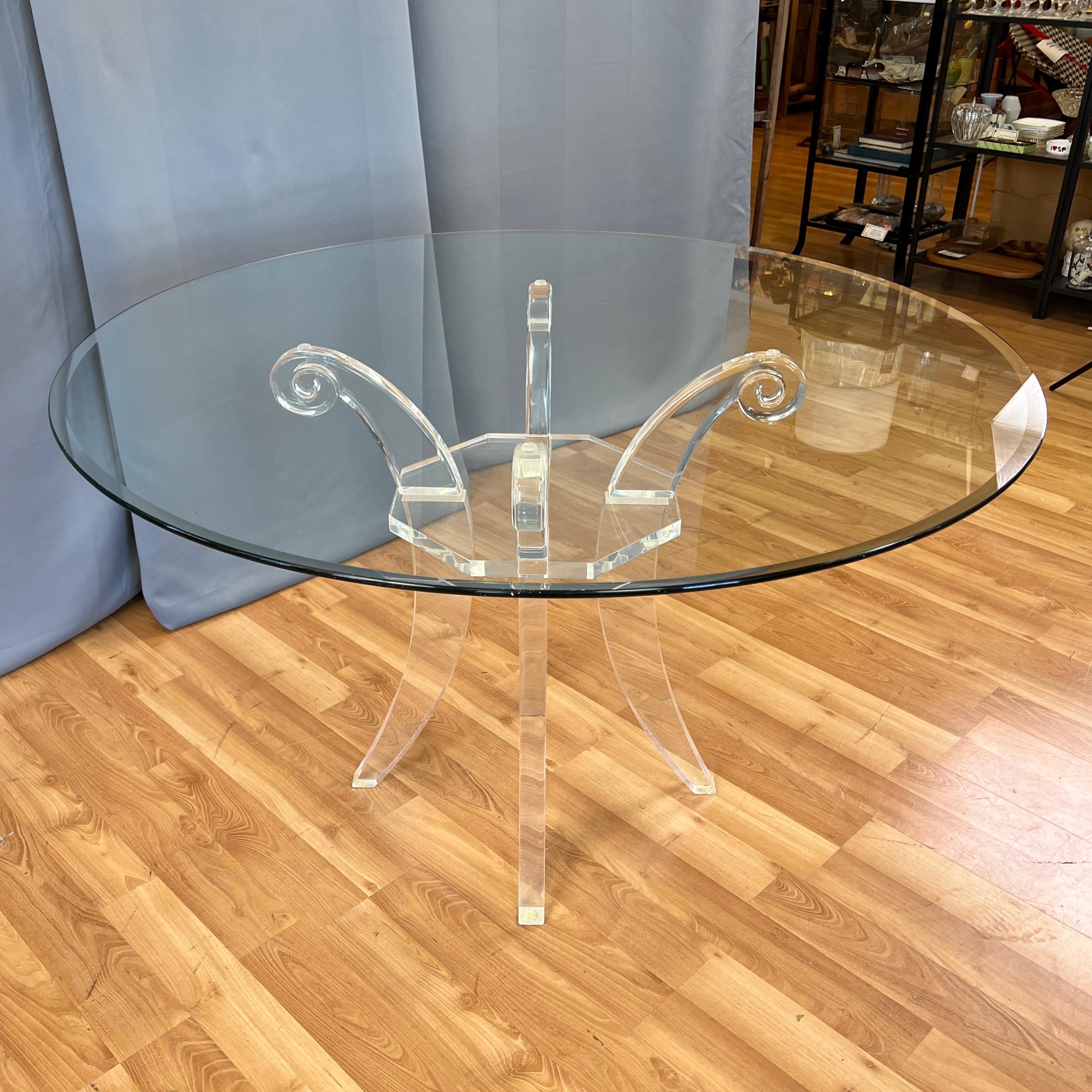 American Lucite Saber Leg Scroll-Motif Dining Table with Round Glass Top, circa 1980