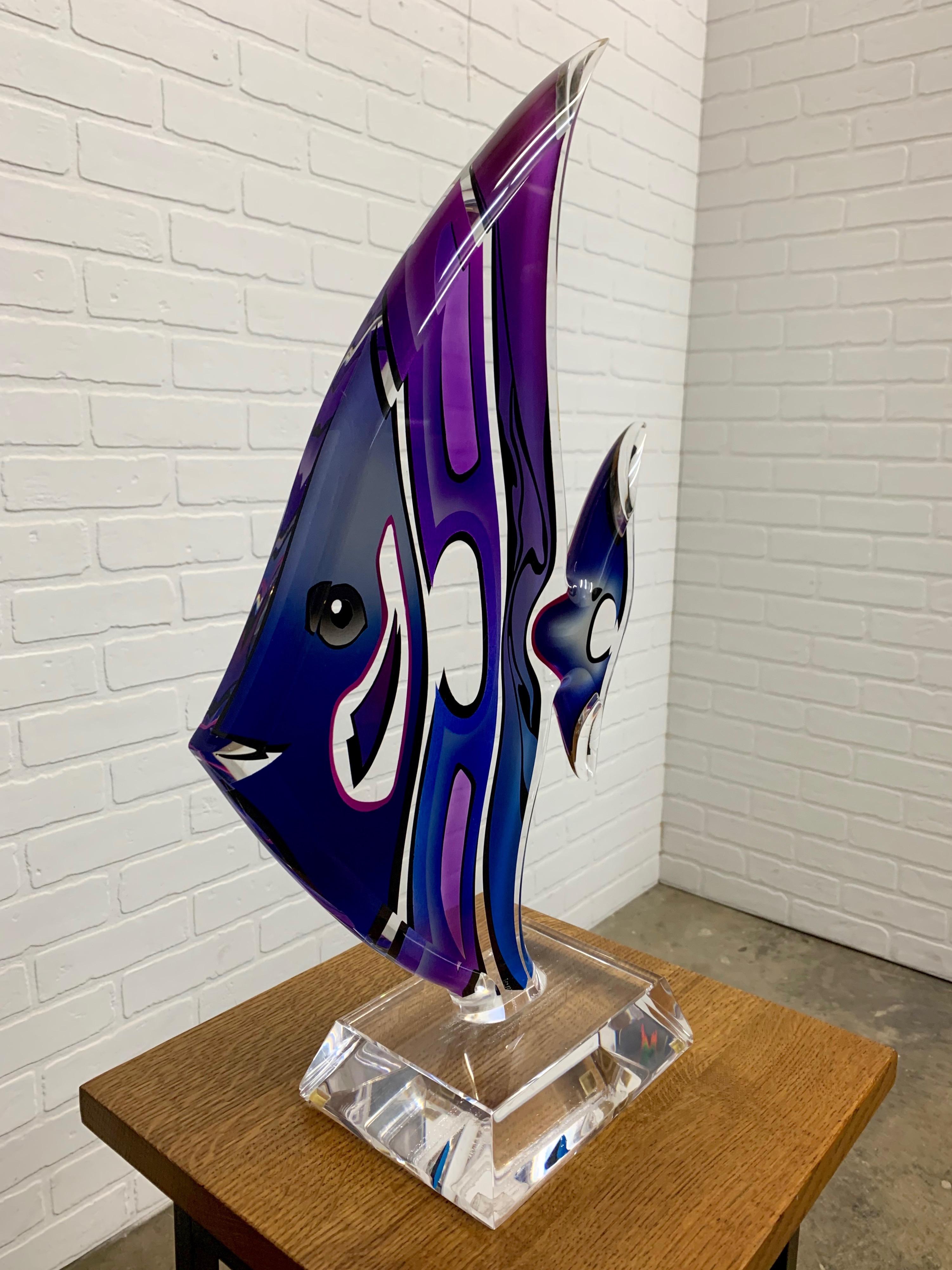 Laminated layers of multicolored Lucite for this outstanding angel fish sculpture.