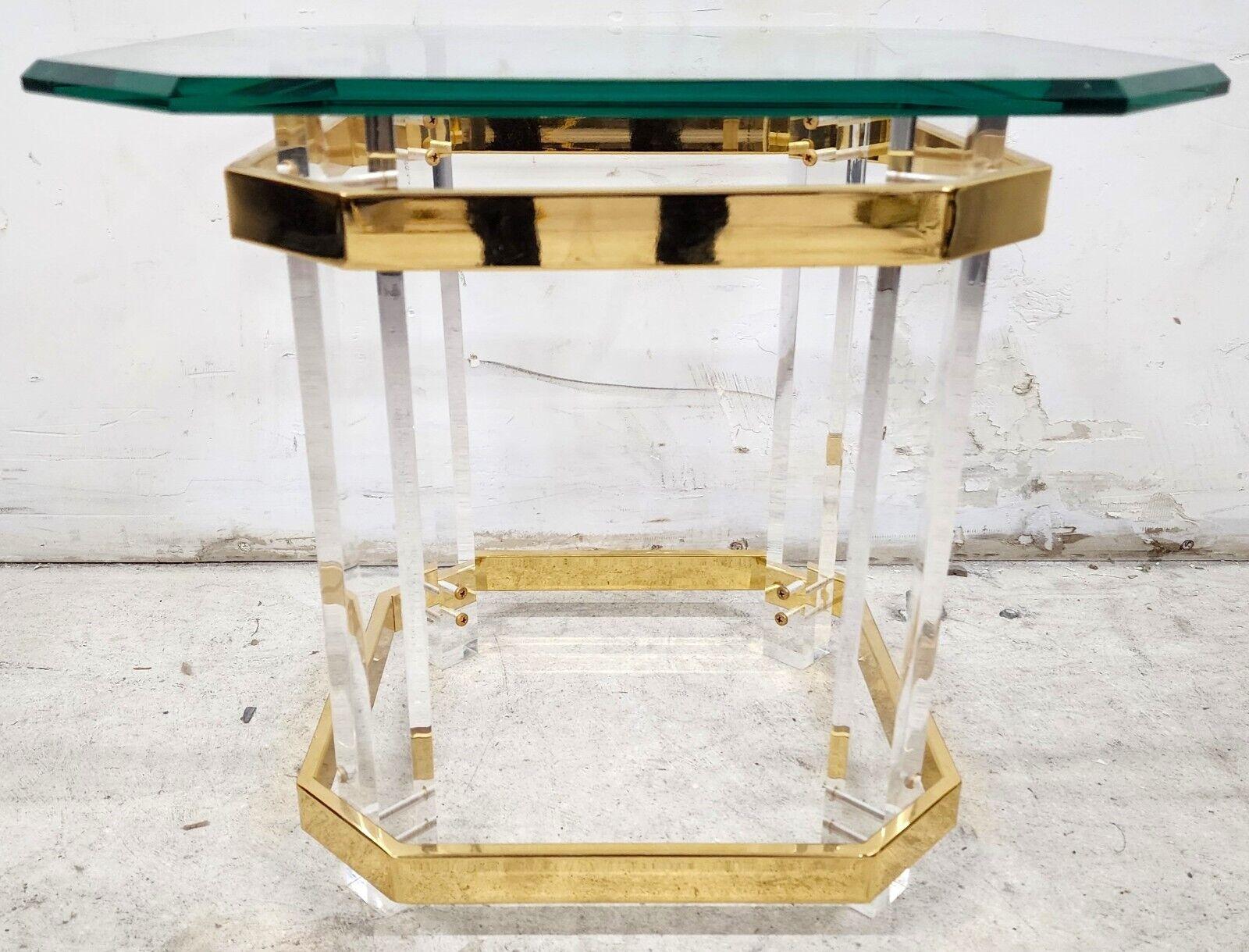 Offering One Of Our Recent Palm Beach Estate fine Furniture Acquisitions Of A 
Charles Hollis Jones Style lucite, Glass & 24 Karat Gold Plated Side Table 
by Regency House of North Carolina
The gold plating prevents any deterioration of the metal