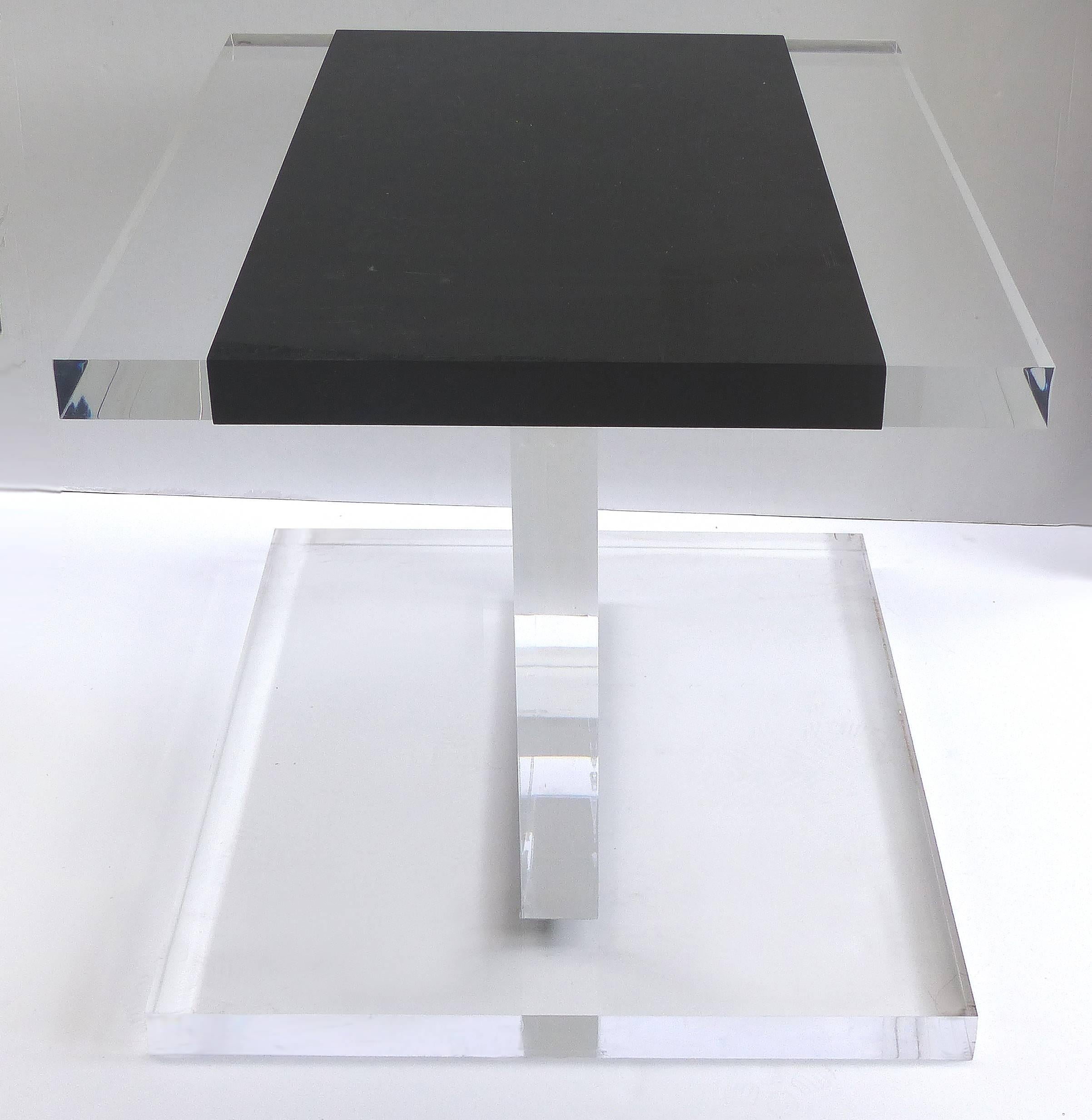 Custom Lucite Side Table with Removable Black Acrylic Sleeve

Offered for sale is a custom-made thick and heavy Lucite side table or pedestal with a removable black plastic sleeve. The Lucite is 1.6