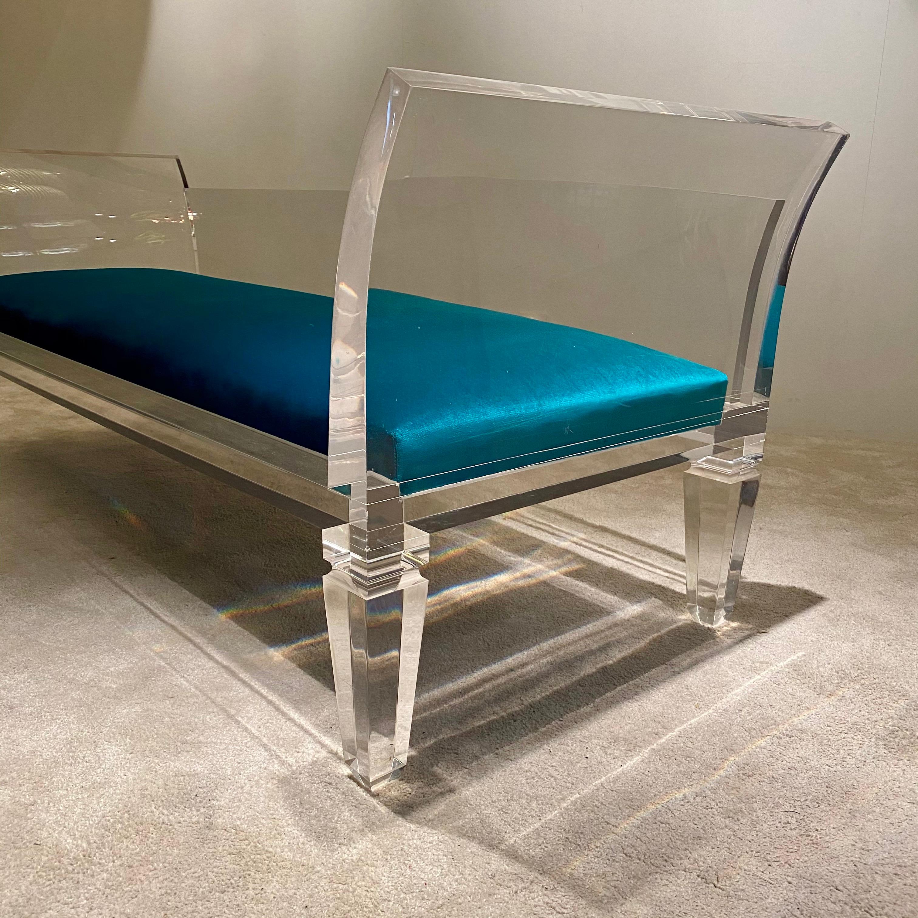 Sofa by Maison Jansen in massive and thick lucite. The french taste with shapes and lines in the neoclassic style.