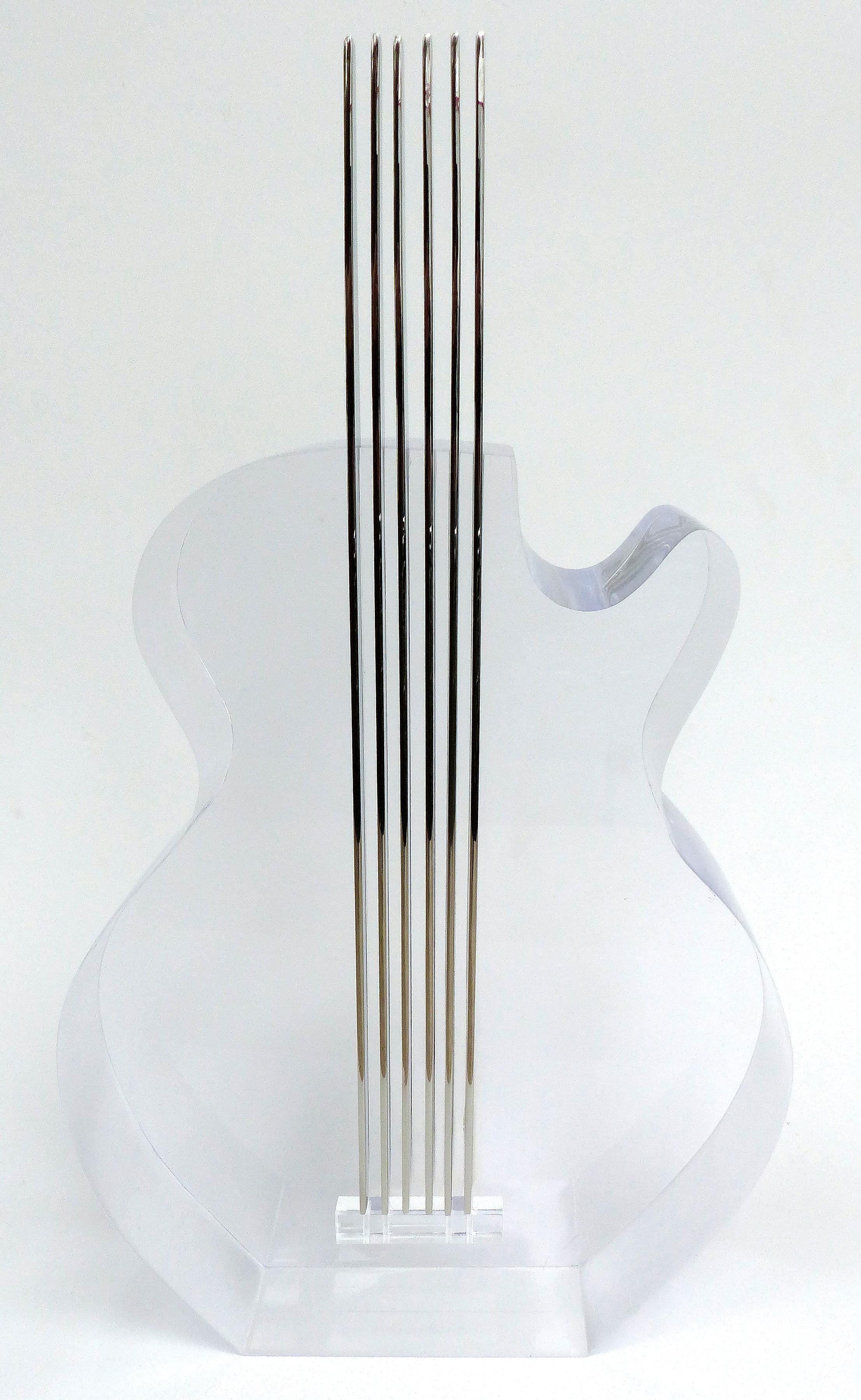 Custom Lucite and Stainless Steel Sculpture of a Guitar

Offered for sale is a Lucite and stainless steel sculpture of a guitar. This original sculpture is made of 4 inch thick Lucite. It is available in custom sizes and with variations. There are