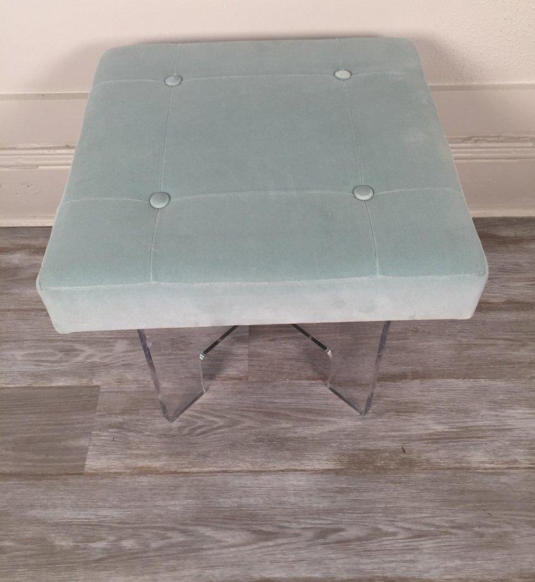 Square Lucite bench or stool with blue velvet upholstery. Can be boxed and shipped through UPS. Price depends on location.