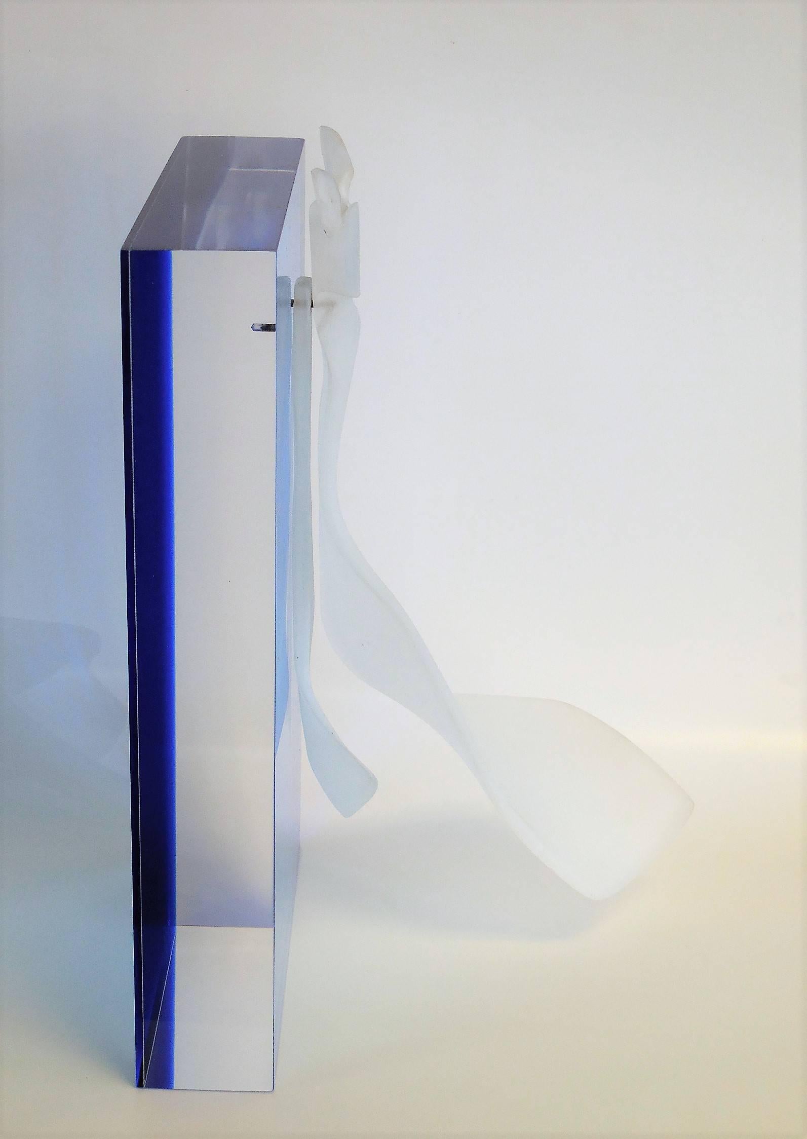 A unique modern Lucite sculpture. A block of Lucite is the background for the realistic sandblasted acrylic tie. Beautifully executed. Name of sculpture is 