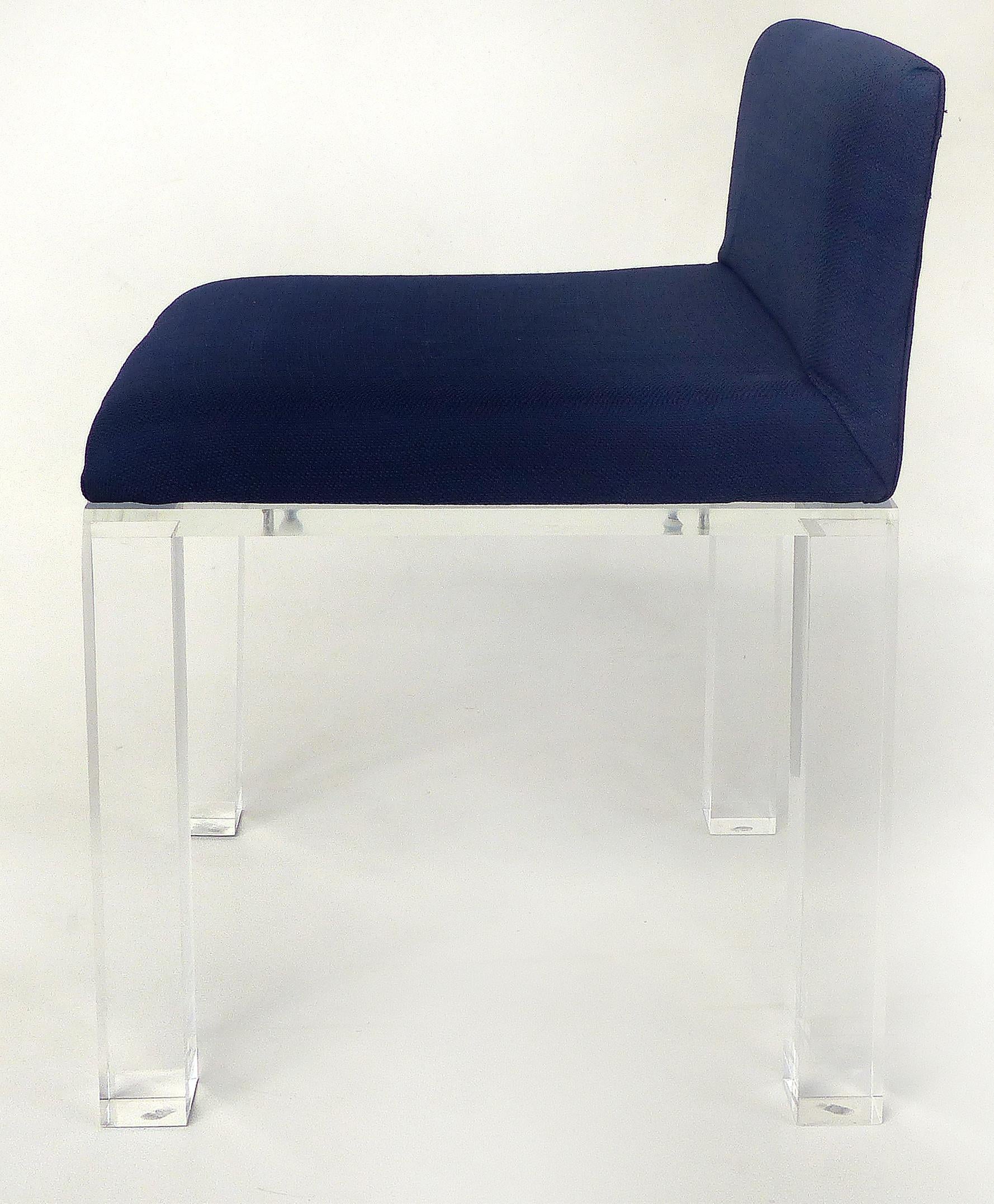 upholstered bench with lucite legs