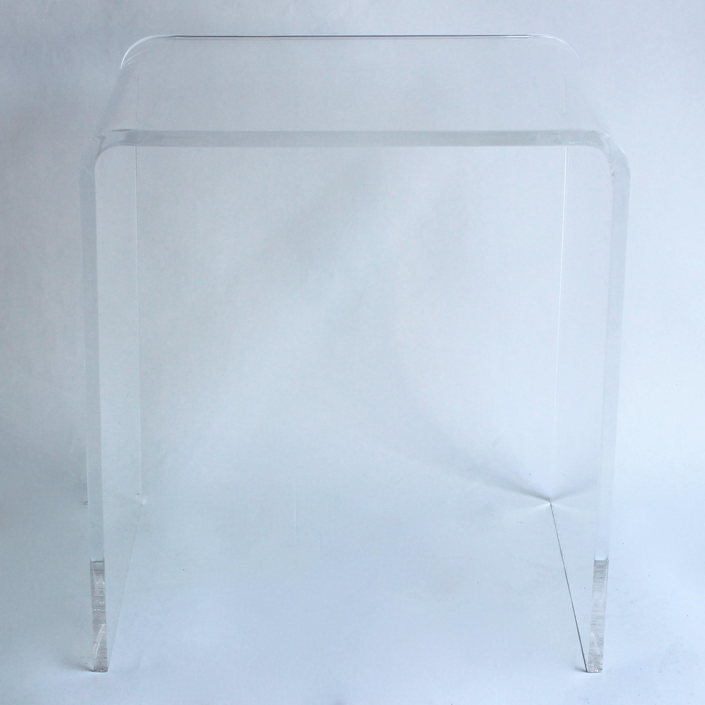 Lucite waterfall stool or side table.