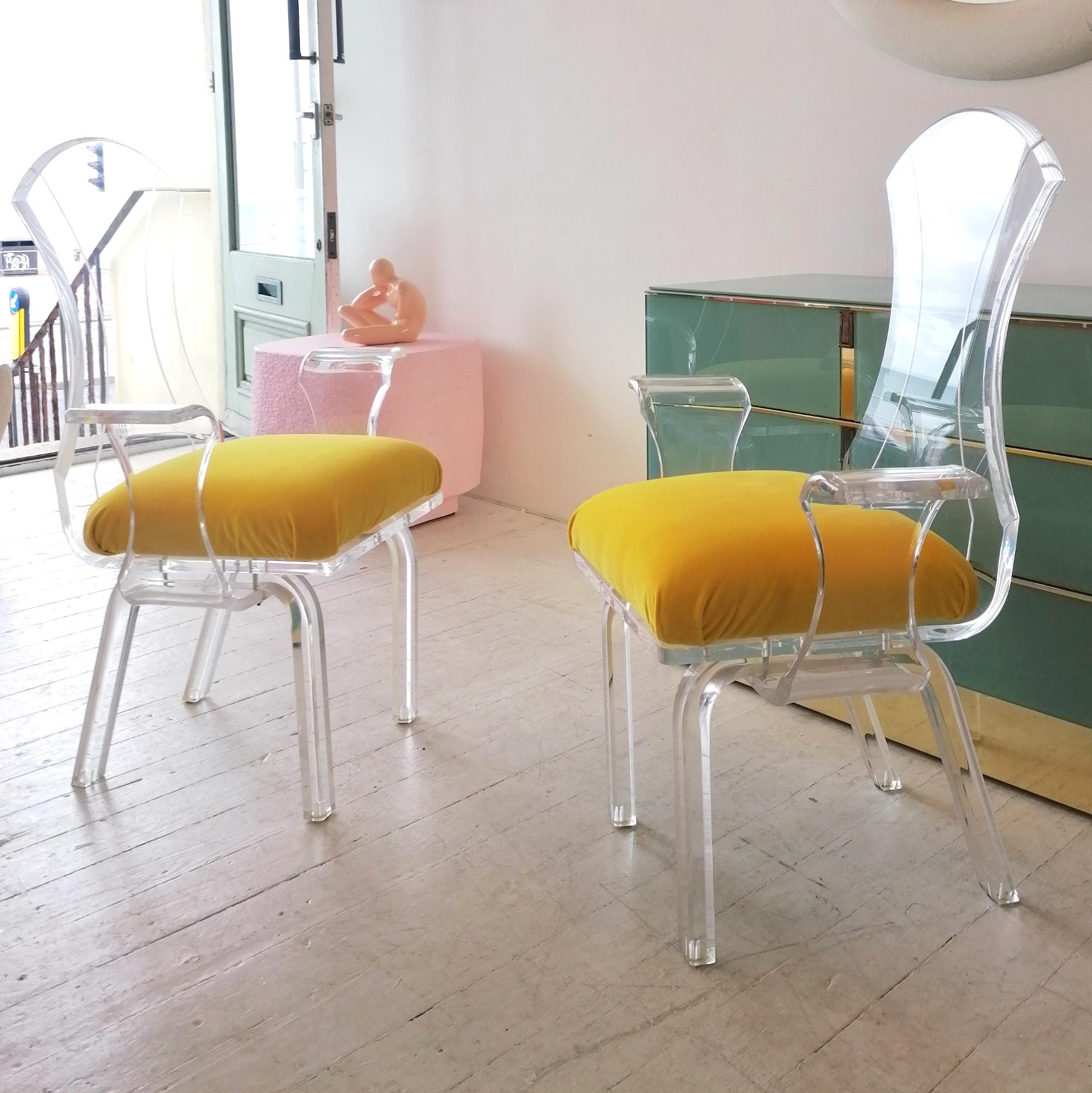American Lucite wing-arm dining or side chairs with yellow velvet seat pads, USA 1980s