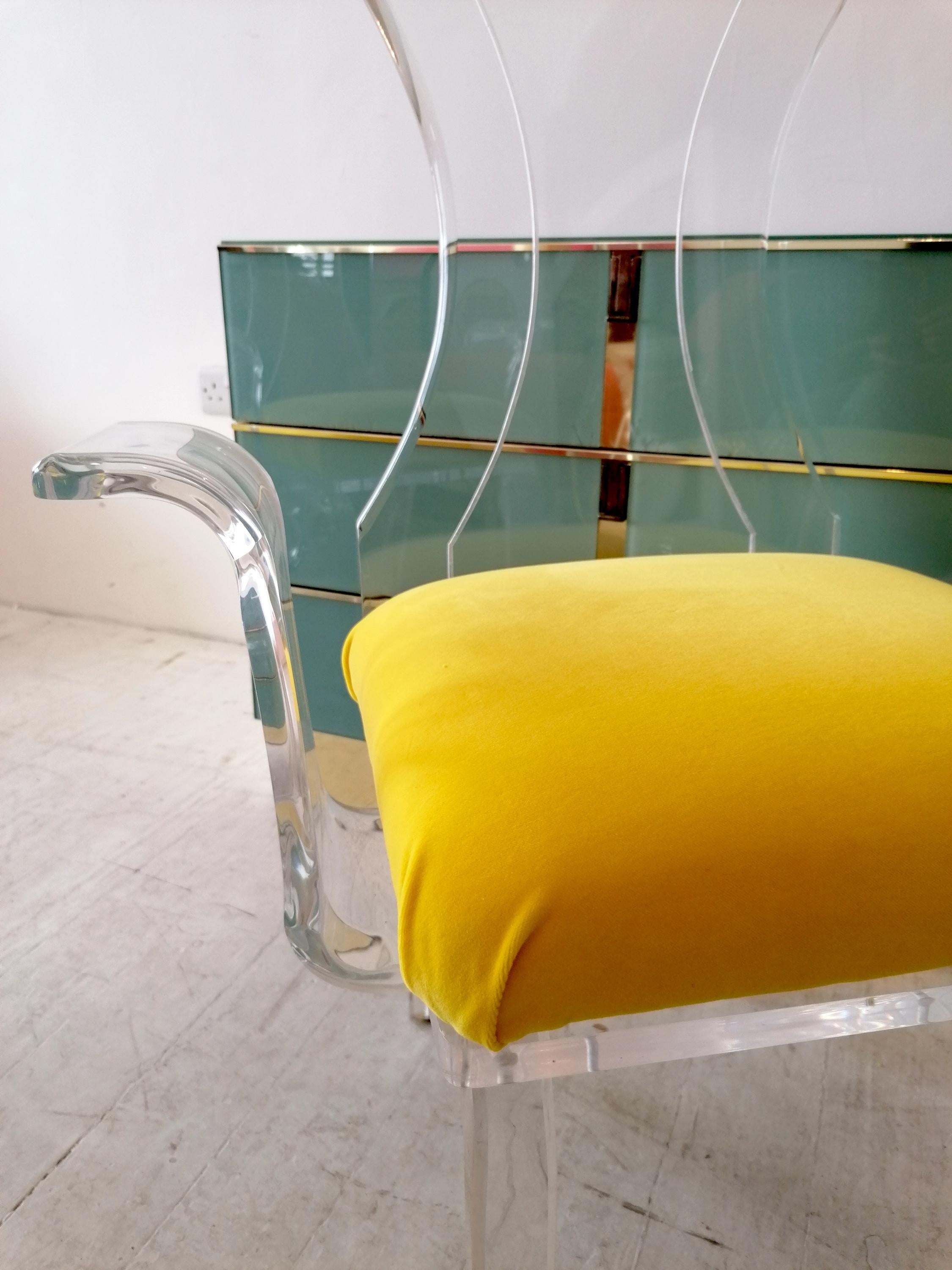 Velvet Lucite wing-arm dining or side chairs with yellow velvet seat pads, USA 1980s