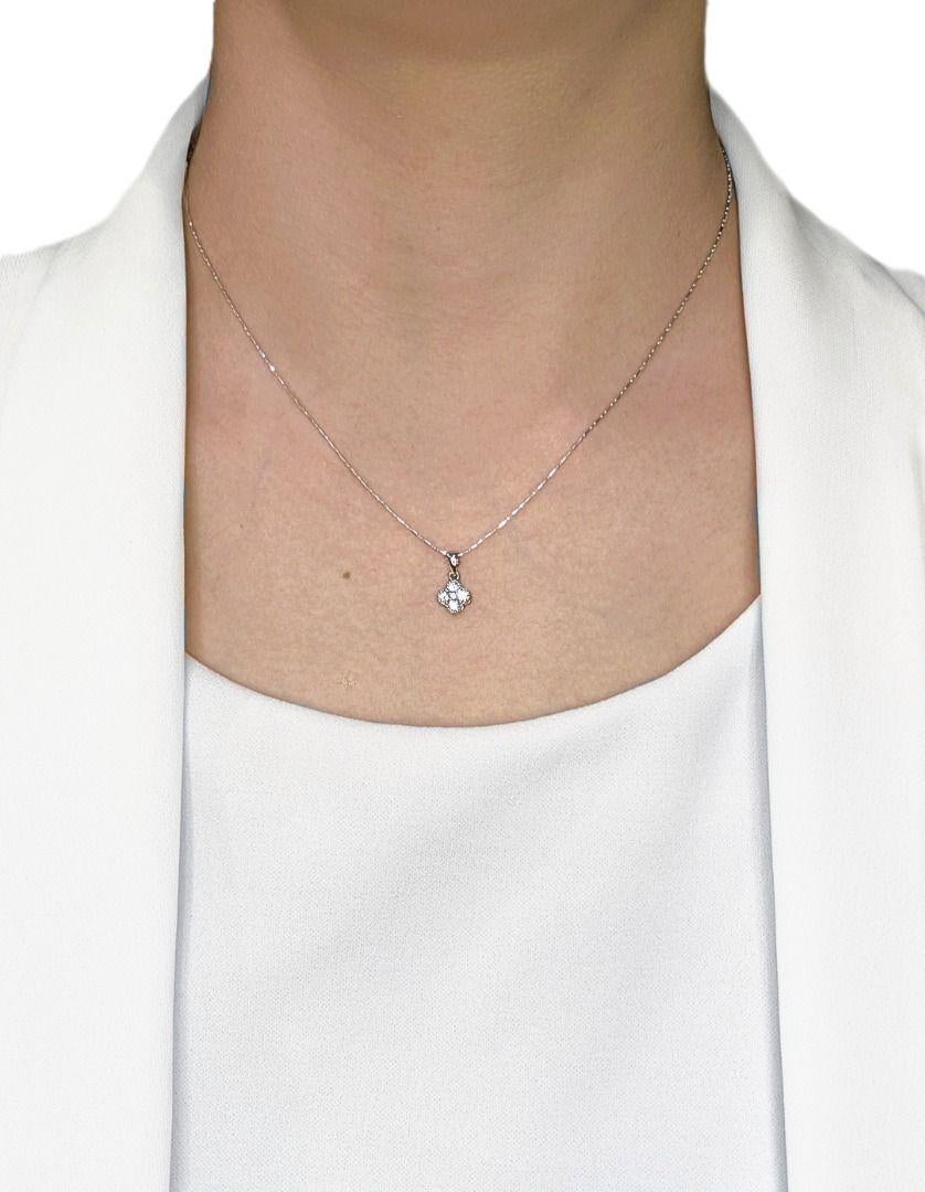 Imagine a delicate symbol of good fortune and sparkling brilliance, beautifully crafted to bring charm to your every day. This enchanting 18K white gold four-leaf clover pendant features five brilliant round diamonds, totaling 0.21ct, with a