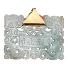 Lucky 14 karat 91.54 gram carved green jadeite pendant