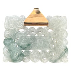 Lucky 14 karat 91.54 gram carved green jadeite pendant