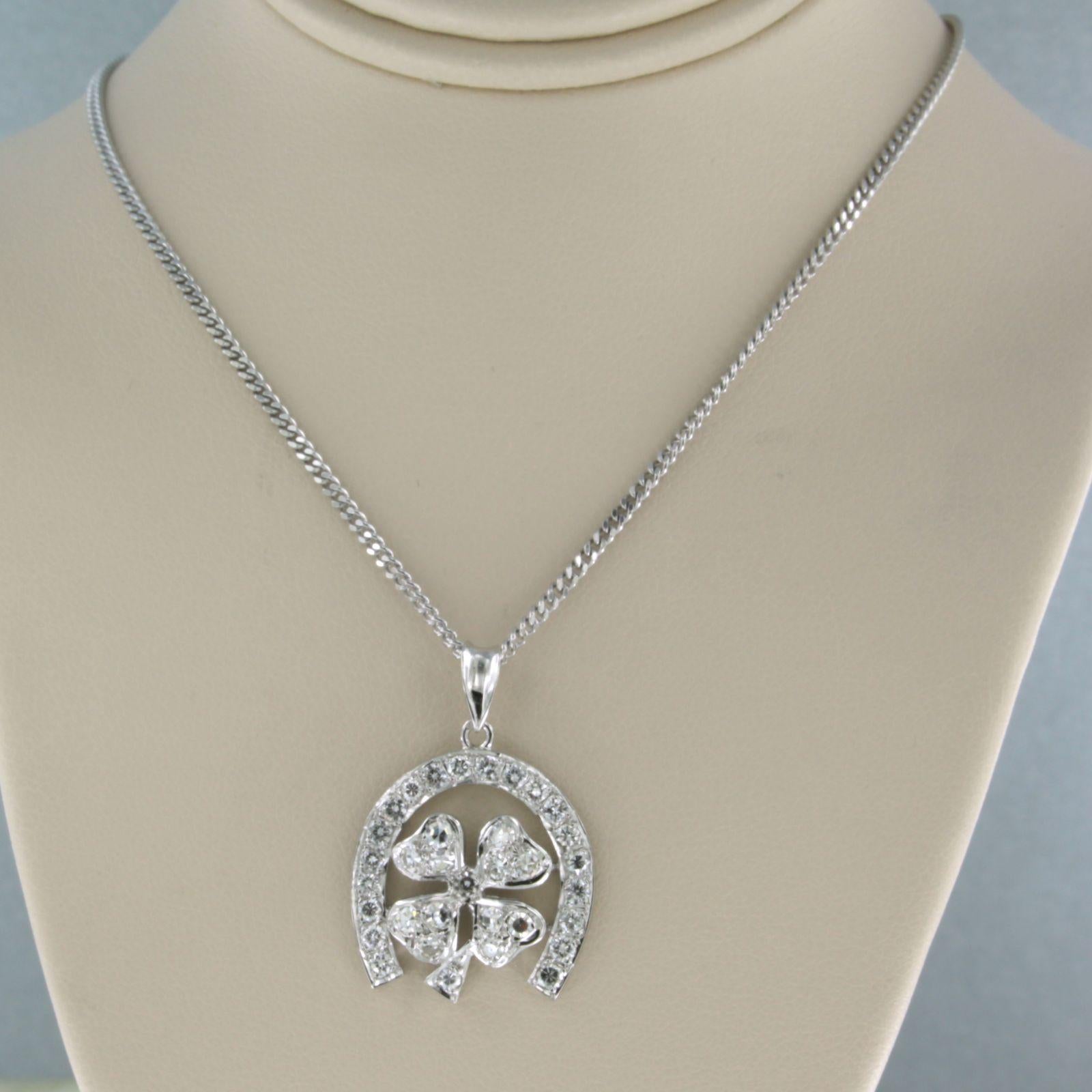 Lucky Charm Irish Leaves Pendant with Diamonds 0.80 carat, with 14k gold necklace

The necklace is 40 cm long (15.7 inch) and 1.7 mm wide (0.07 inch)

The pendant is approx. 2.8 cm heigh (1.1 inch) and 1.9 cm wide (0.7 inch)

Total weight is 7.7