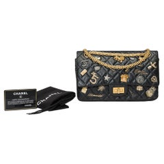 Lucky Charms 2.55 Chanel double flap shoulder bag in black quilted leather, AGHW