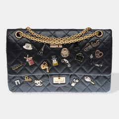Lucky Charms 2.55 Chanel double flap shoulder bag in black quilted leather, AGHW