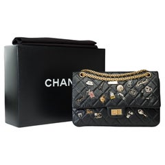 Lucky Charms 2.55 Chanel double flap shoulder bag in black quilted leather, AGHW
