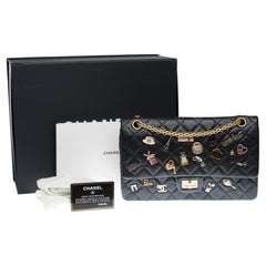 Lucky Charms 2.55 Chanel double flap shoulder bag in black quilted leather, AGHW