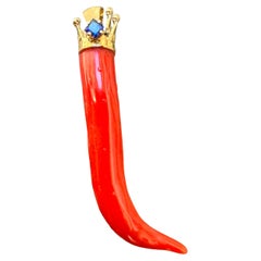 Lucky Horn in Italian Coral 18 Karat Gold Crown and a Sapphire Pendant