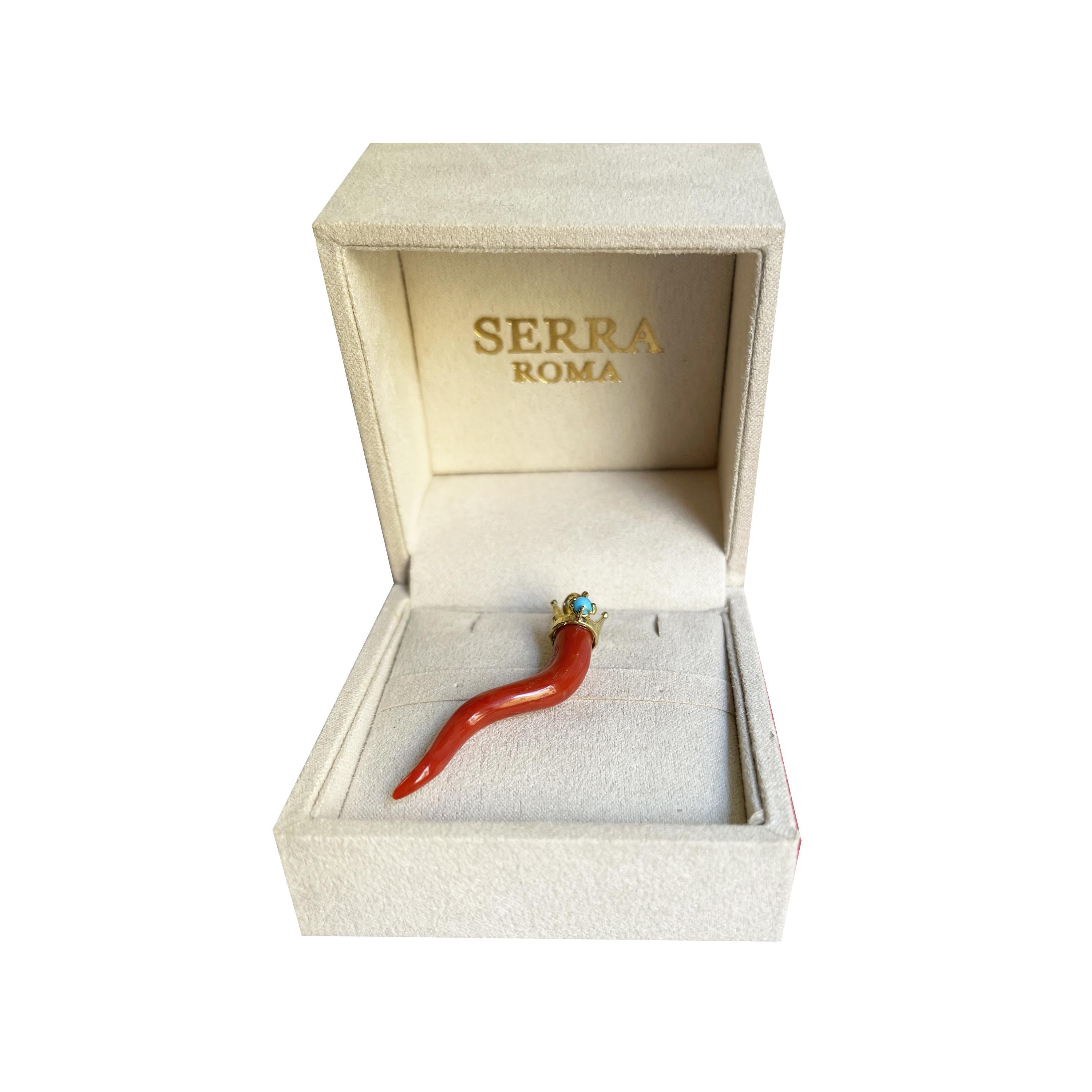 This beautiful coral and 18 Kt gold horn comes from the Italian sea and was purchased in Torre del Greco, which has a long tradition in coral jewelry, and then mounted with an 18 Kt gold crown and a small sapphire by our goldsmiths. . 
Going back in