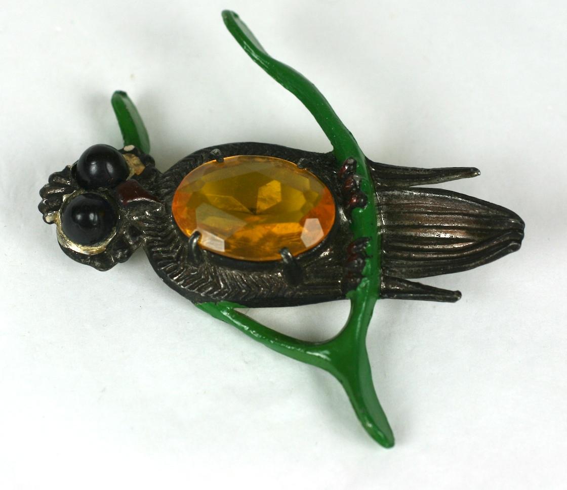 Charming Lucky Owl on Horseshoe Brooch from the 1930's. Art Deco period novelty design with large owl with faux citrine belly and jet cab eyes perched on a lucky green enameled horse shoe shaped branch. 
1930's USA.  3