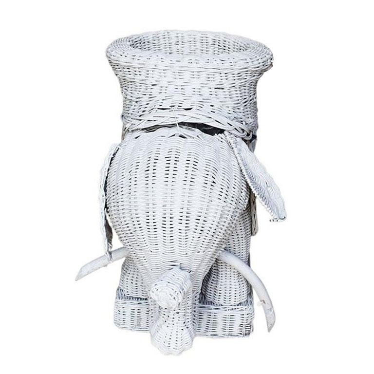 white wicker plant stand