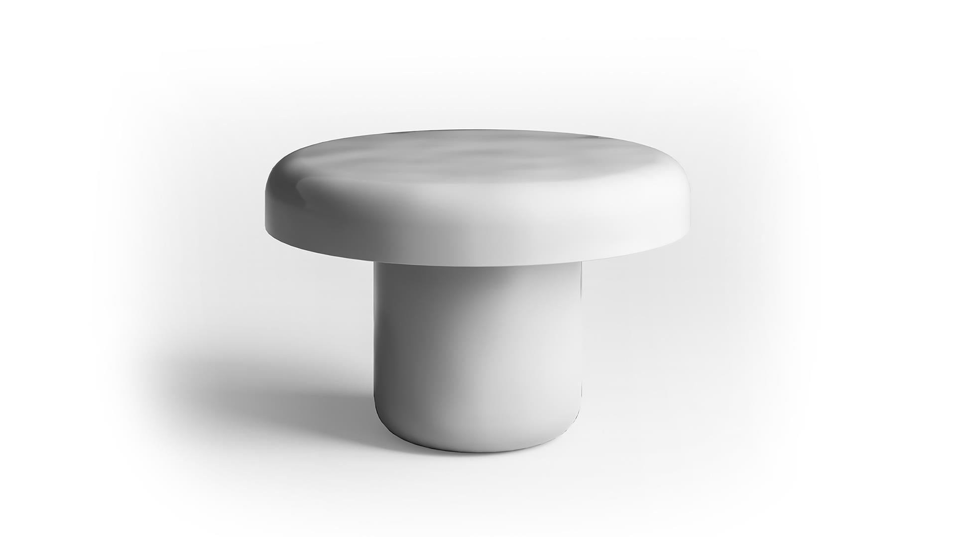 Voici la table basse Luckybay - Wimbledon de la collection Dwell, une pièce remarquable qui met en valeur l'utilisation innovante du grès dans le design contemporain. Cette collection présente d'élégantes tables basses et des accessoires fabriqués