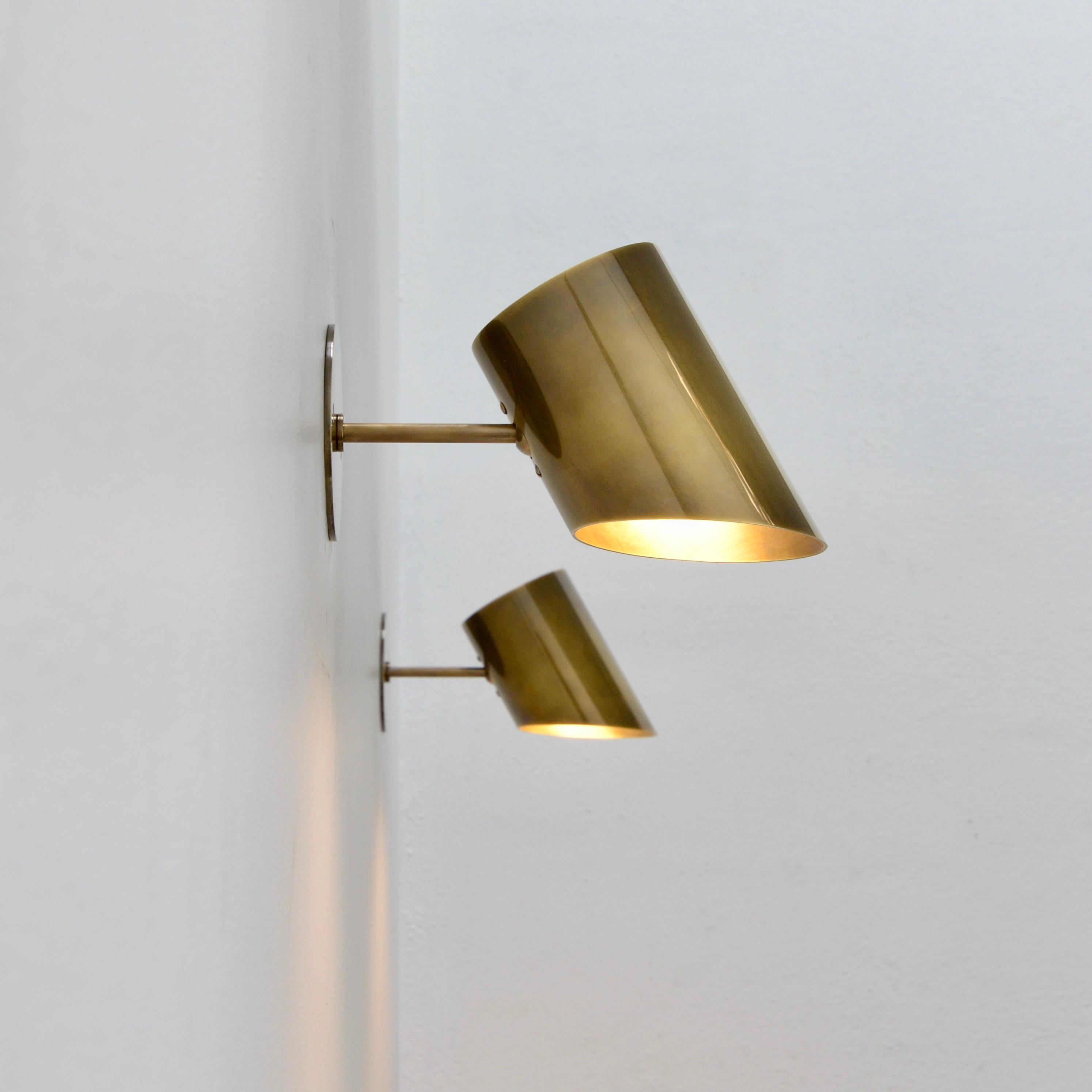 Part of Lumfardo Luminaries contemporary collection, the LUcona Sconce is a classic mid century modern design made to order. Crafted from all brass, this fixture fully articulates for directional illumination and can be wired for any worldwide