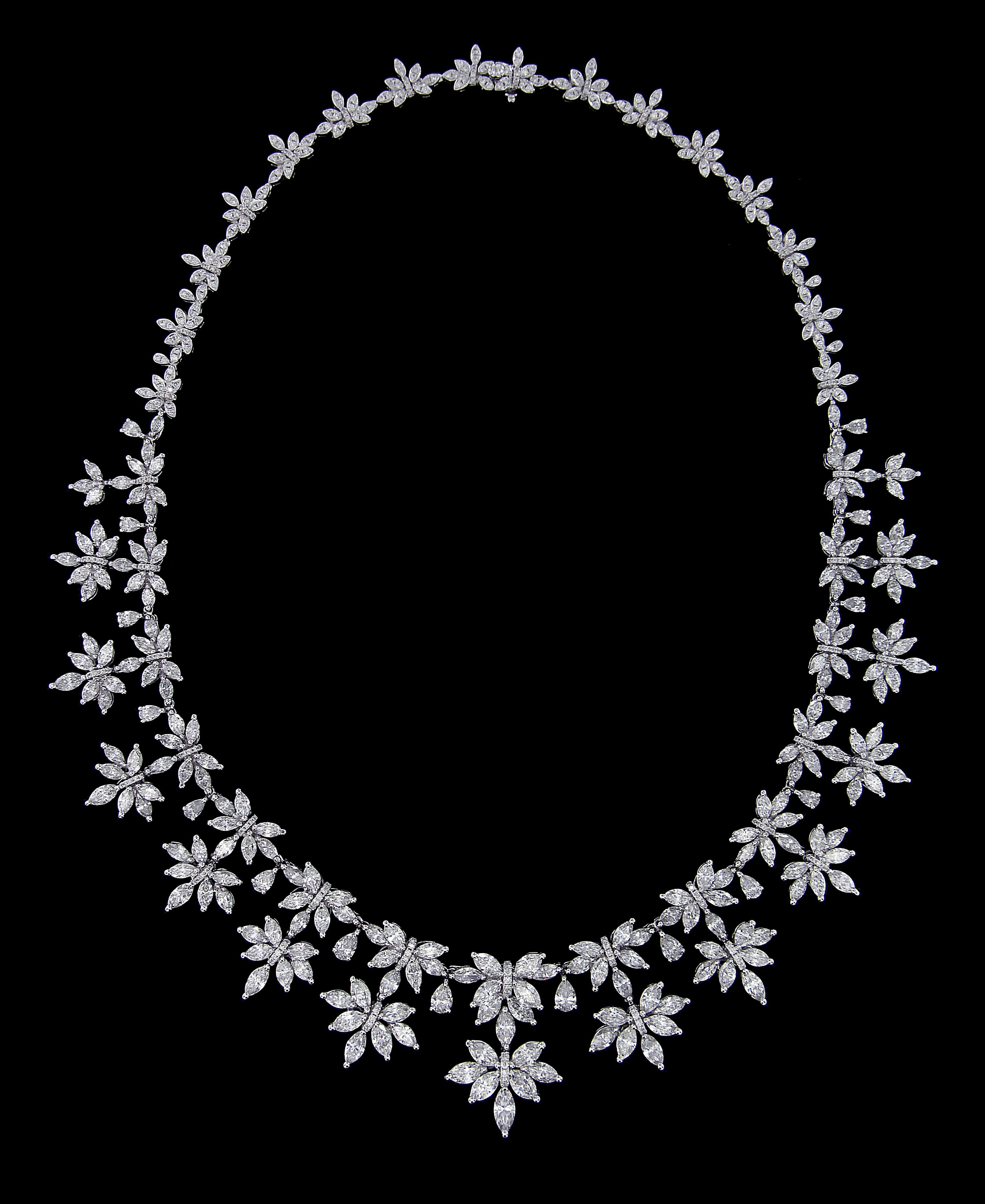 Lucullan 18 Karat white Gold And Diamond Wedding Set.
Necklace:
Diamonds of approximately 27.315 carats, mounted on 18 karat white gold necklace. The Necklace weighs approximately around 52.507 grams.


Please note: The charges specified do not