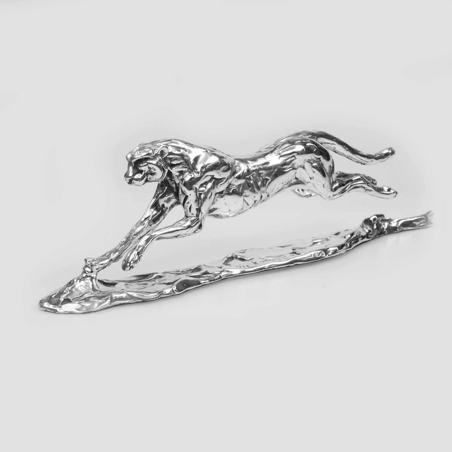 The limited edition finely modelled cheetah racing across the ground at full speed, his head and front legs stretched forward and his back legs and tail flying out behind him.  His body at full stretch creates a graceful and streamlined figure. He