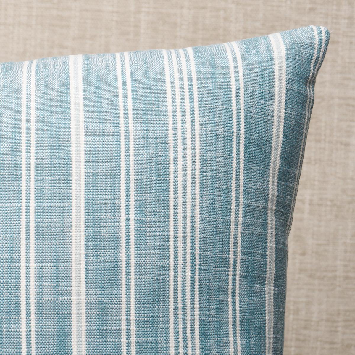 This pillow features Lucy Stripe by Mark D. Sikes with a knife edge finish. Mark D. Sikes had style and versatility in mind when he created Lucy Stripe, an updated version of a traditional batik stripe. Pillow includes a feather/down fill insert and