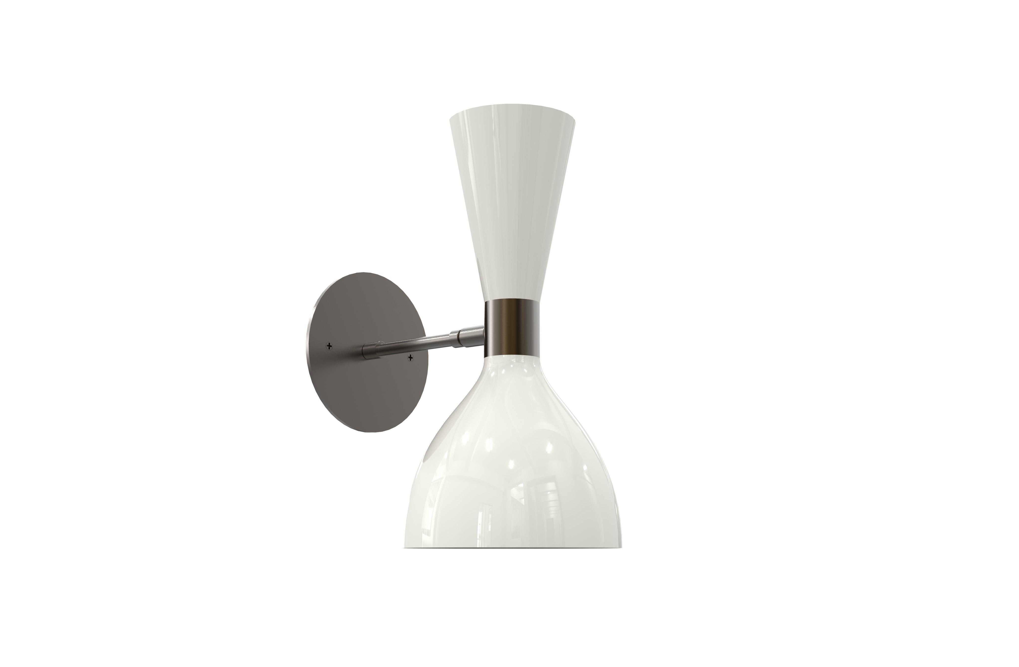 Our best-selling Ludo wall sconce or reading light, handmade by Blueprint Lighting. The spun aluminium cones are a vintage 1950s Italian design. Swiveling head allows for cone adjustment.  You may select from any of our 36 enamel colors and 6 metal