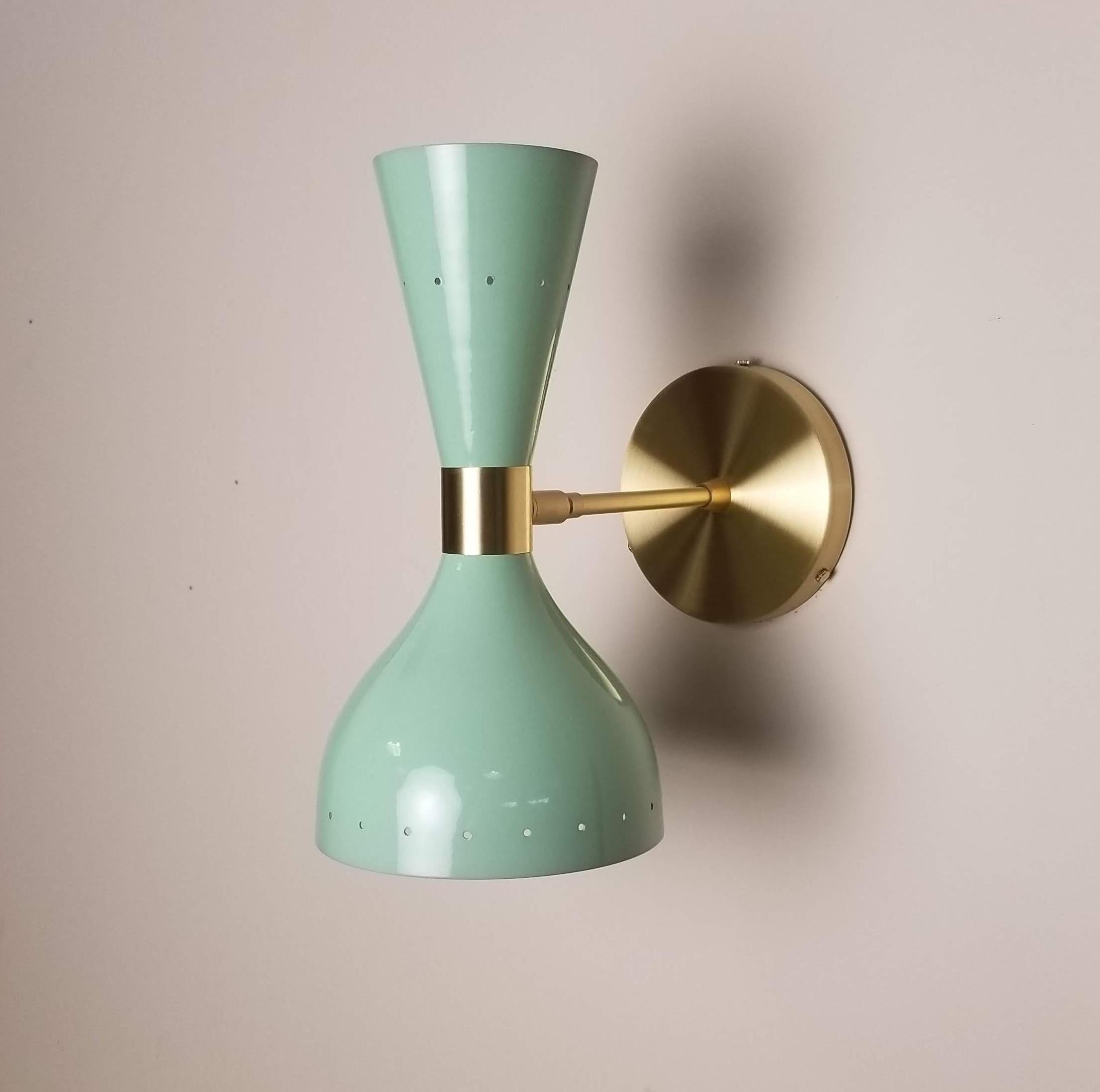 Our best-selling LUDO wall sconce or reading light shown in natural brass and our lovely 