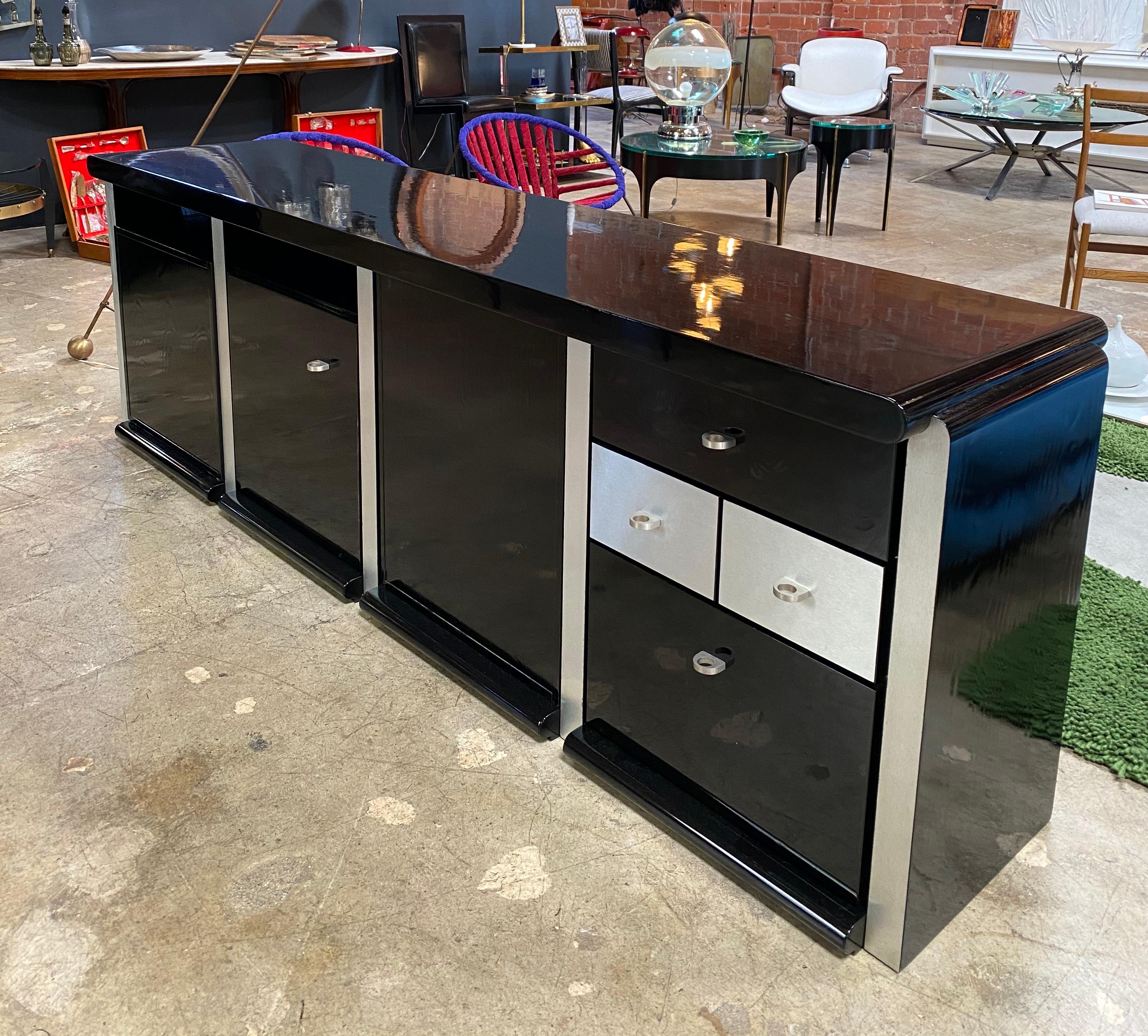 Sideboard or sideboard designed by Ludovico Acerbis for Acerbis in Italy, circa 1970s. Black rosewood with contrasting finishes and drawers in stainless steel. Three storage compartments with hinged doors and a set of two front drawers in steel and