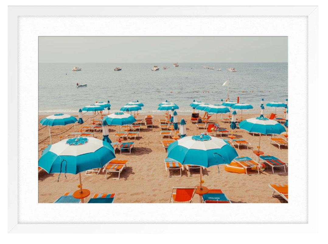 Amalfi Coast, Blue Umbrella - Beige Landscape Photograph by Ludwig Favre