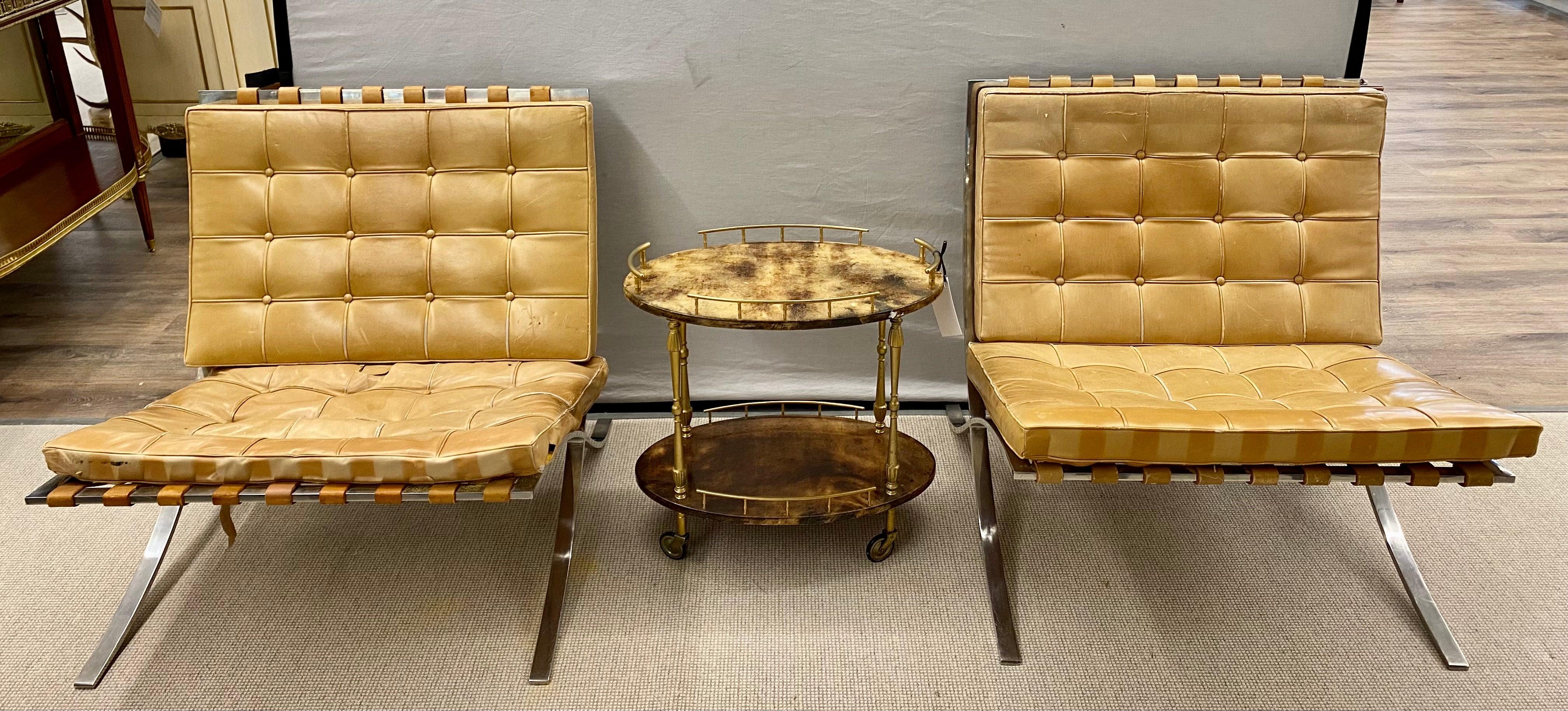Ludwig Mies van der Rohe (German-American, 1886-1969) pair of Barcelona lounge chairs, Knoll International, USA
Steel, leather H 29 1/2 x W 29 1/4 x D 29 3/4 inches. Labeled. Need to be re upholstered/ cushions changed. Our gallery can assist with