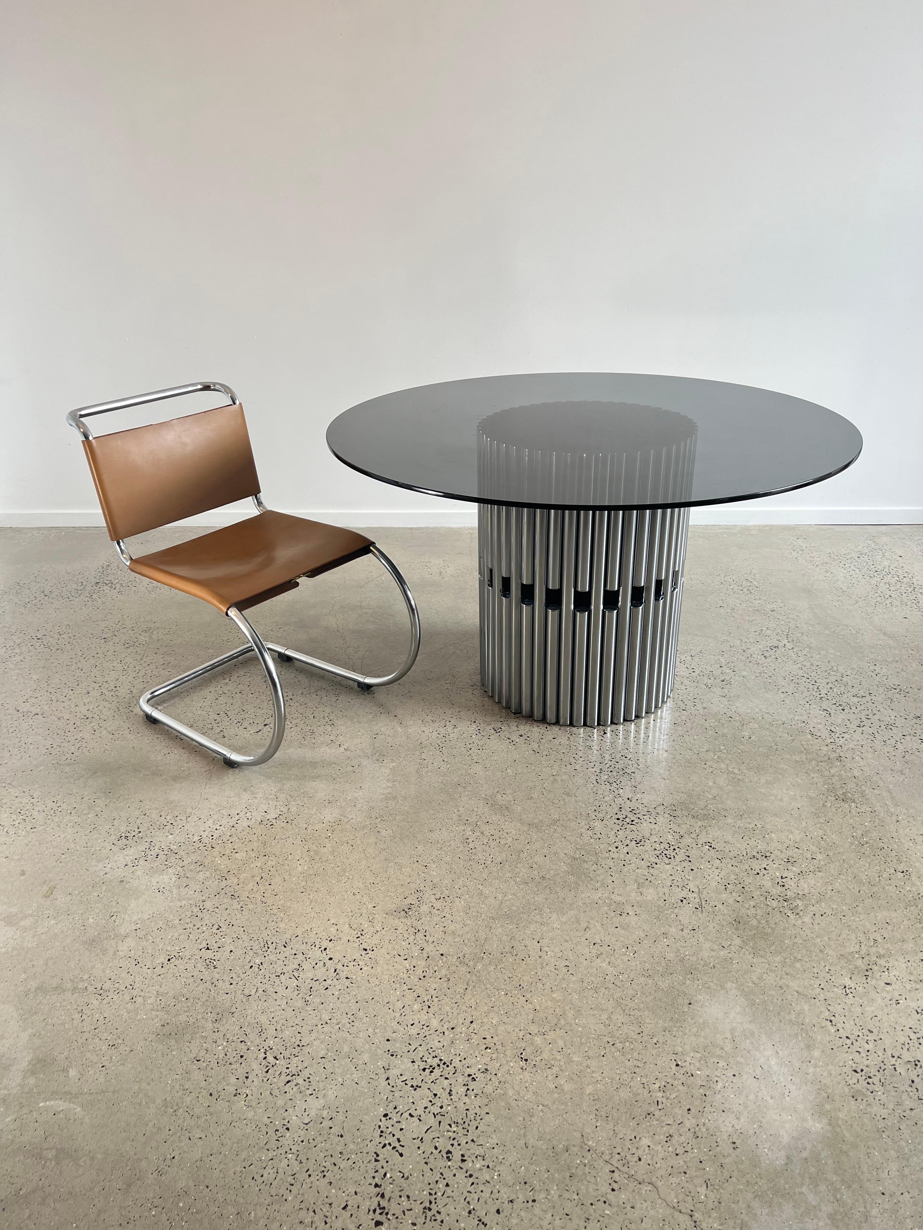 These iconic MR10 dining chairs designed by Ludwig Mies Van der Rohe and manufactured by Knoll International are cherished for their sleek design, high quality of metal work and
 overall comfort.