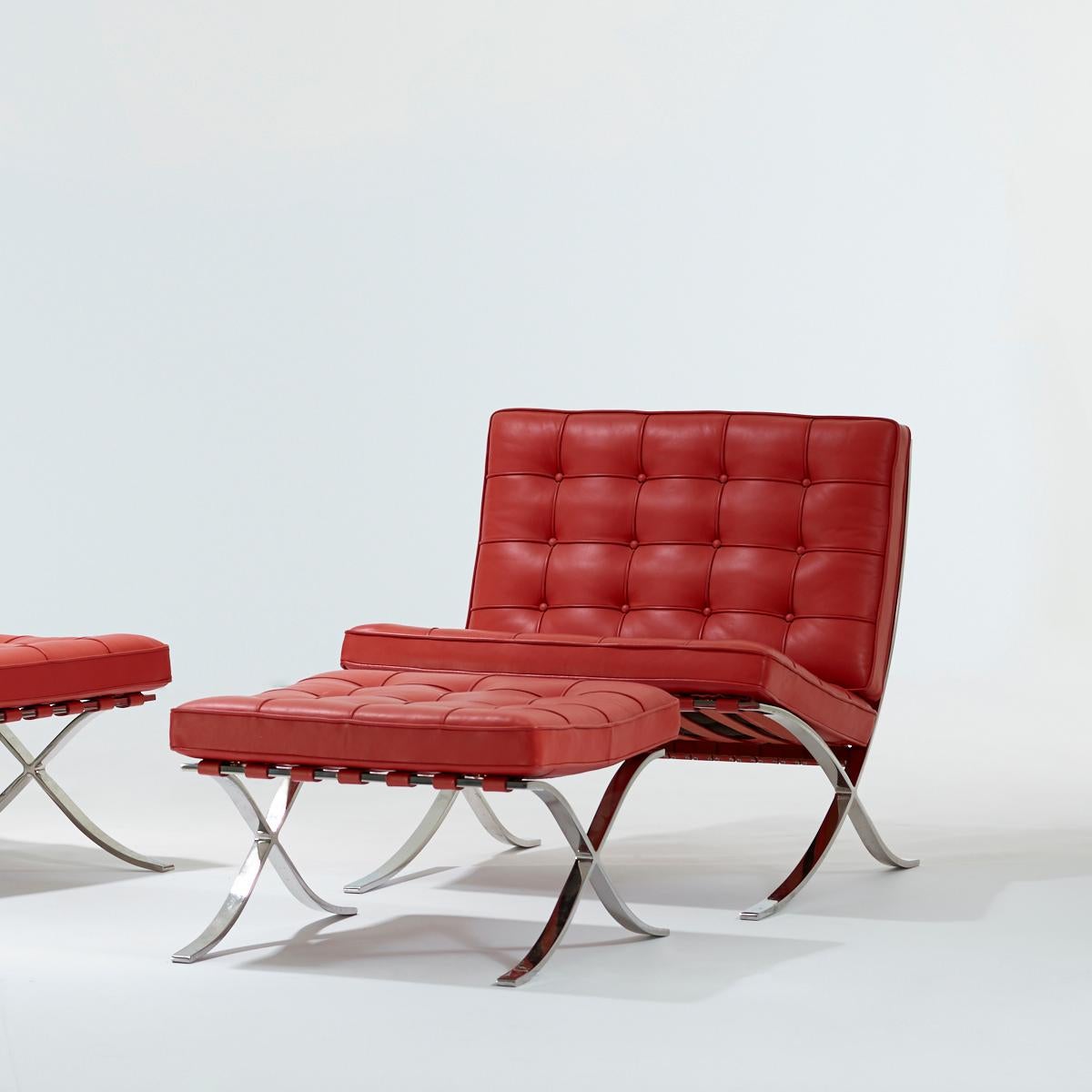 Ludwig Mies van der Rohe for Knoll pair of Barcelona chairs and ottomans 

Custom ordered red leather
Labelled and dated 'Knoll Group'

Set custom ordered with all original materials intact

Measures 
Chair 30 W × 30 D × 30 H in (each)
Ottoman 24.5
