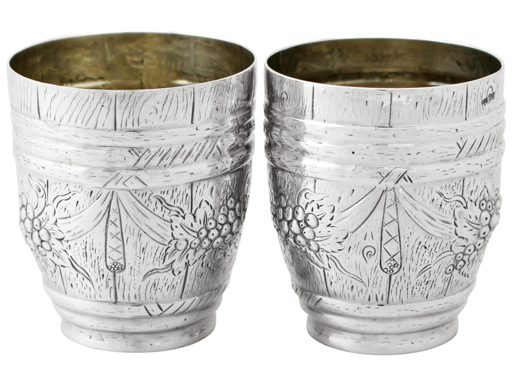 A fine pair of antique German silver beakers; an addition to our continental antique silverware collection.

These fine antique German silver beakers have been realistically modelled in the form of a barrel.

The circular rounded surface of each
