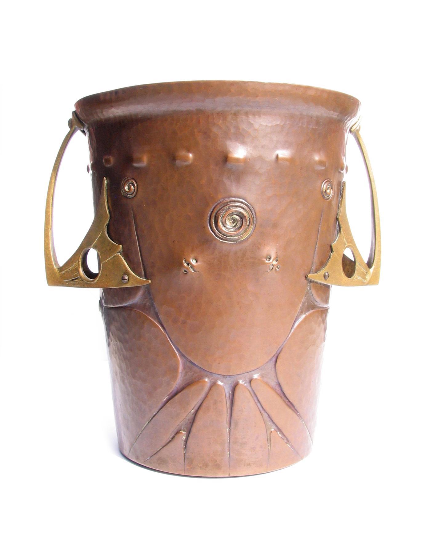Ludwig Karl Maria Vierthaler repoussé copper bronze champagne bucket with cast bronze handles. Manufactured by Josef Winhart & Company, circa 1906.

Born in Munich in 1875, Ludwig Vierthaler's designs caught the eye of Tiffany & Company, New York,