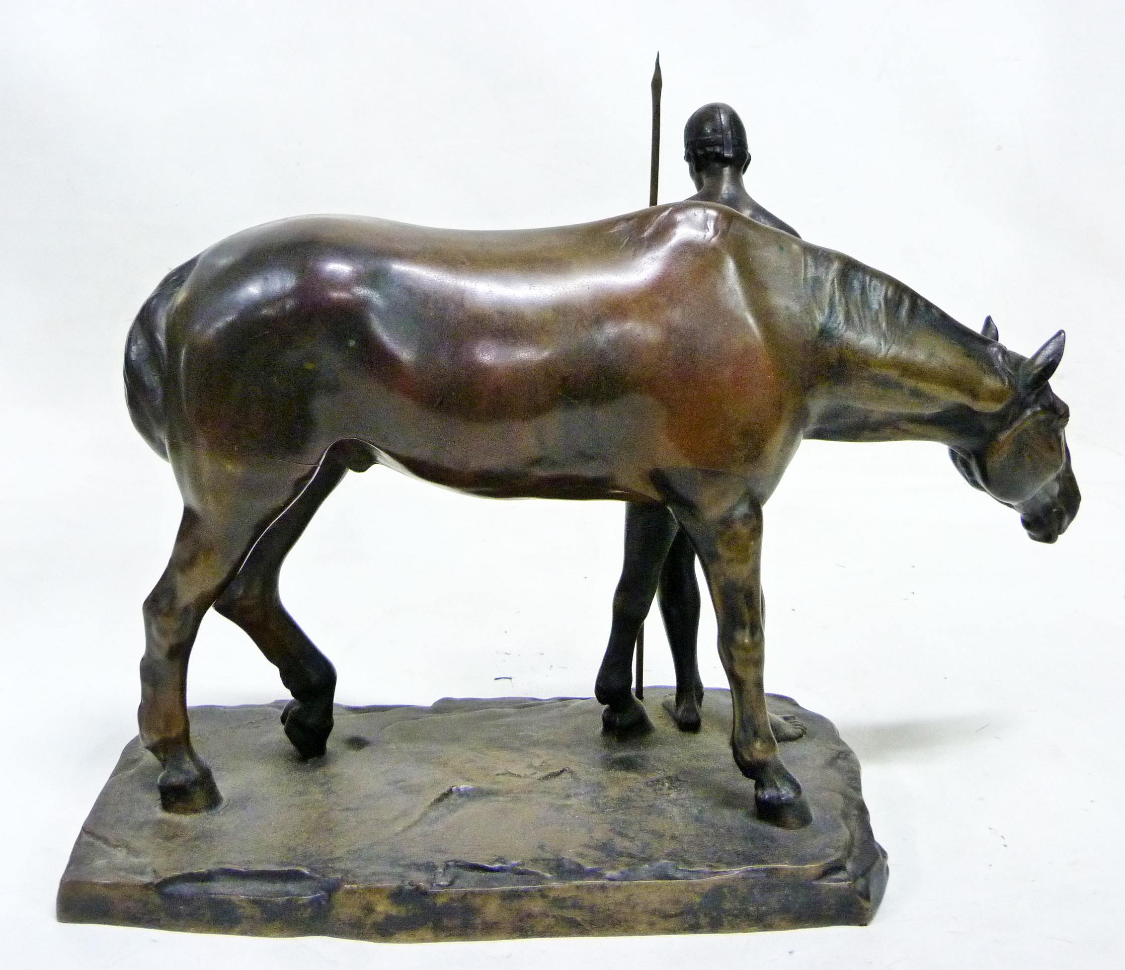 Bronze sculpture with medal patina nuanced depicting a warrior resting near his horse and holding a spear in his hand. Signed L. Vordermayer on the right base and bearing the mark of the Gladenbeck founder in Berlin.

ABOUT THE ARTIST
Ludwig