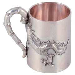 Vintage Luen-Wo, Shanghai. Silver cup with handle. Relief dragon motif. 1930s