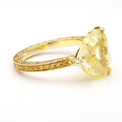 Lugano GIA-Certified 4.19 Carat Fancy Intense Yellow Heart-Shaped Diamond Ring