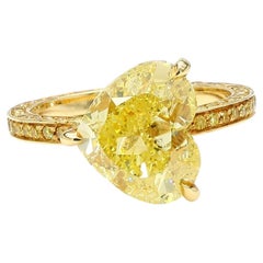 Lugano GIA-Certified 4.19 Carat Fancy Intense Yellow Heart-Shaped Diamond Ring
