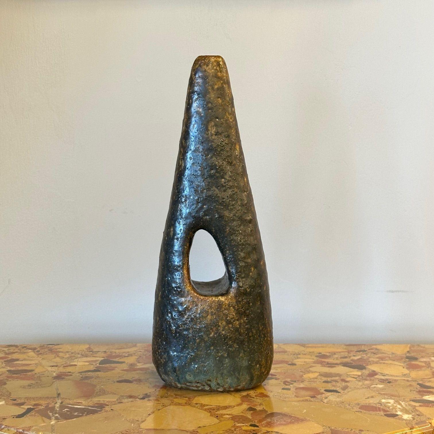 Luigi and Sophie De Lerma, Italian Mid-Century Modern, Organic Stoneware Vase

An organic modern vase designed by Luigi and Sophie De Lerma and produced in Italy circa 1940s. Incised monogram in cross to underside 'LSTC'.

Glazed Stoneware
Italy, c.