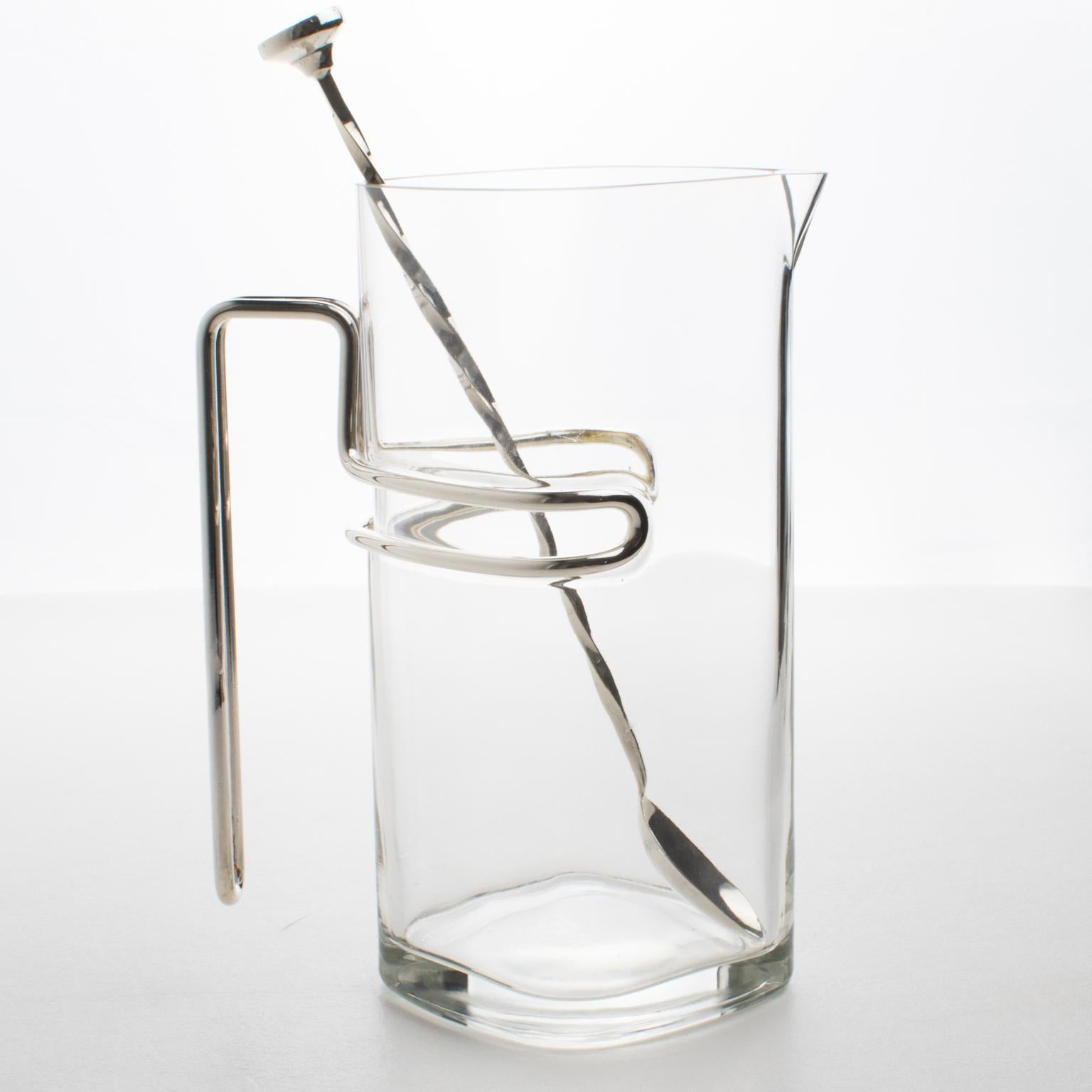 An elegant streamlined barware set designed by Luigi Bormioli for its Light and Music Collection in the 1980s. Sleek and modernist flair, the square-shaped pitcher has a thick gauge silver plated wire wrapped around the container to form a