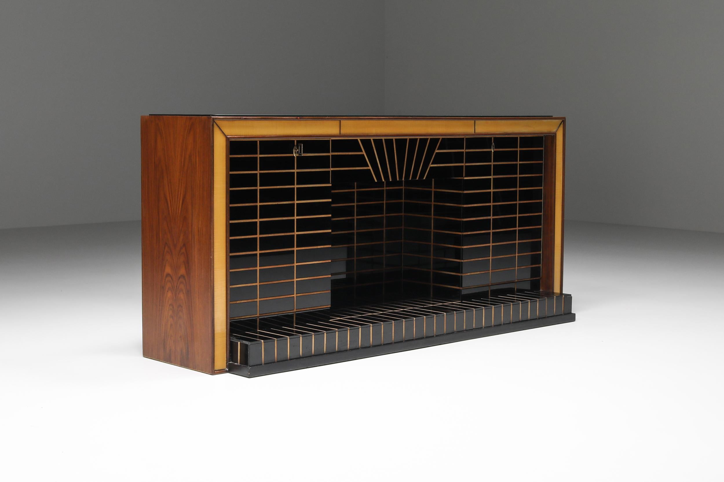 Buffet with fireplace by Luigi Brusotti; Mid-century modern; 1940's; Credenza; Art Deco; Italian design; Walnut, beech, veneer & glass; 

Extraordinary sideboard by Luigi Brusotti. Can also be used as a large dry bar. The body of the cabinet is in