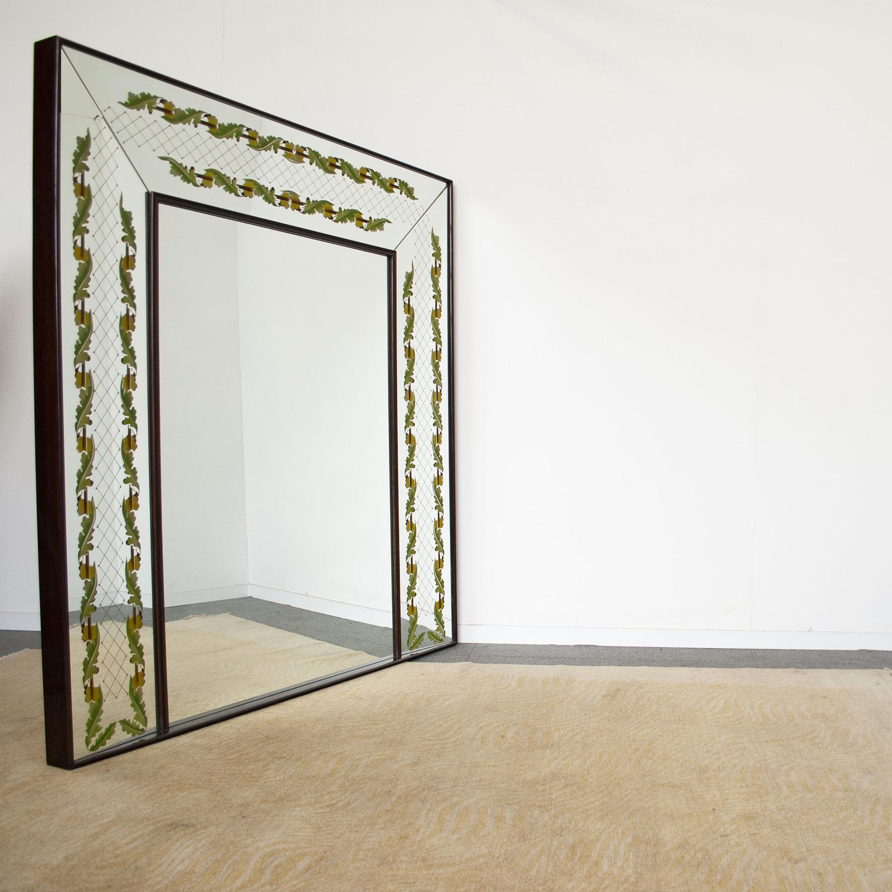 Monumental backlit mirror with graphic engraving on the perimeter with wooden frame, production end 40’s Luigi Brusotti, probably made by Fontana Arte .
