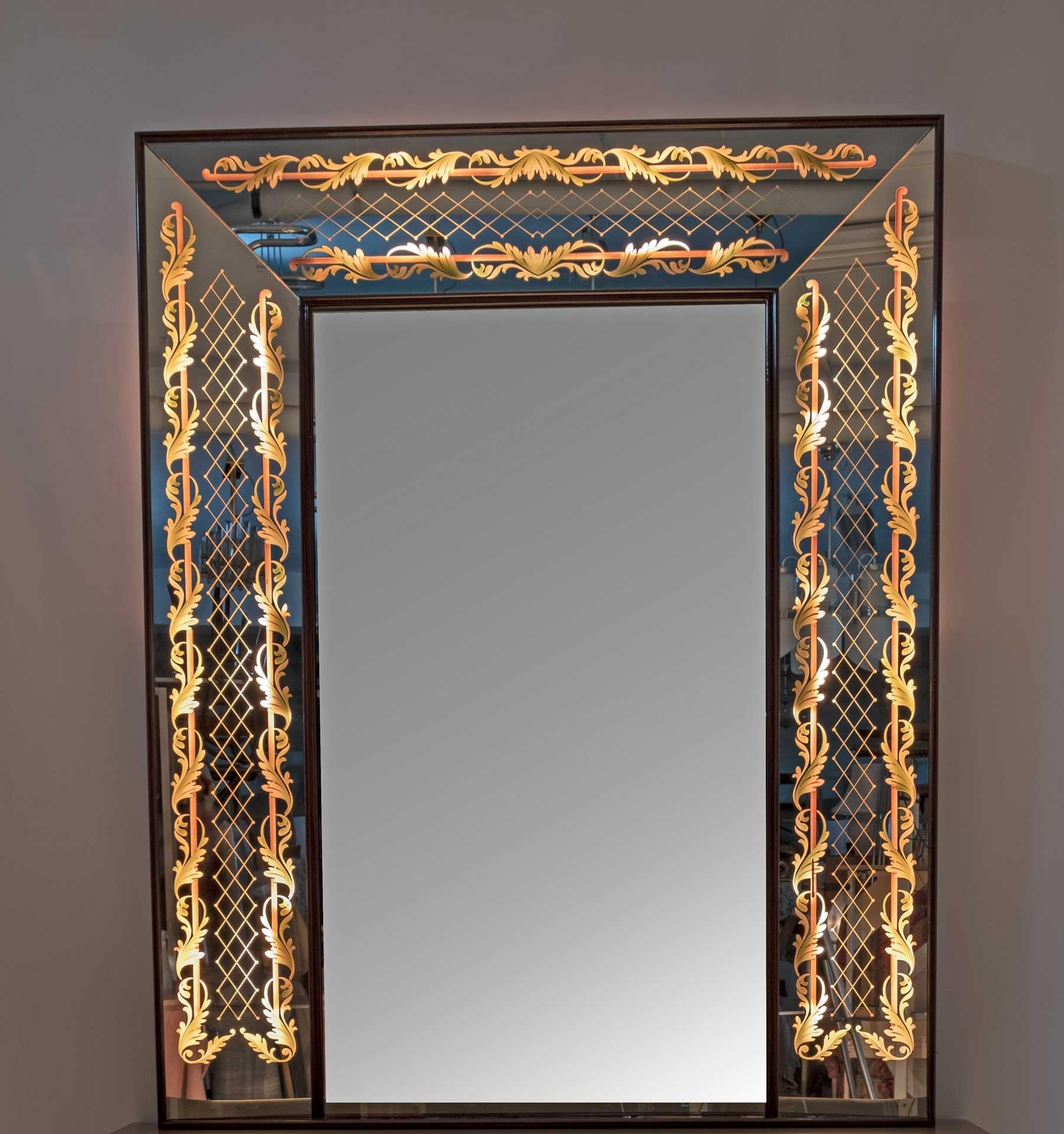 Large Italian Mid-Century Modern Decorative mirror by Luigi Brusotti, 1940s
Mirror, backlit along the perimeter, corresponding to the yellow and green decorative motifs drawn on the front. Structure in solid wood.
Probable Fontana Arte production.