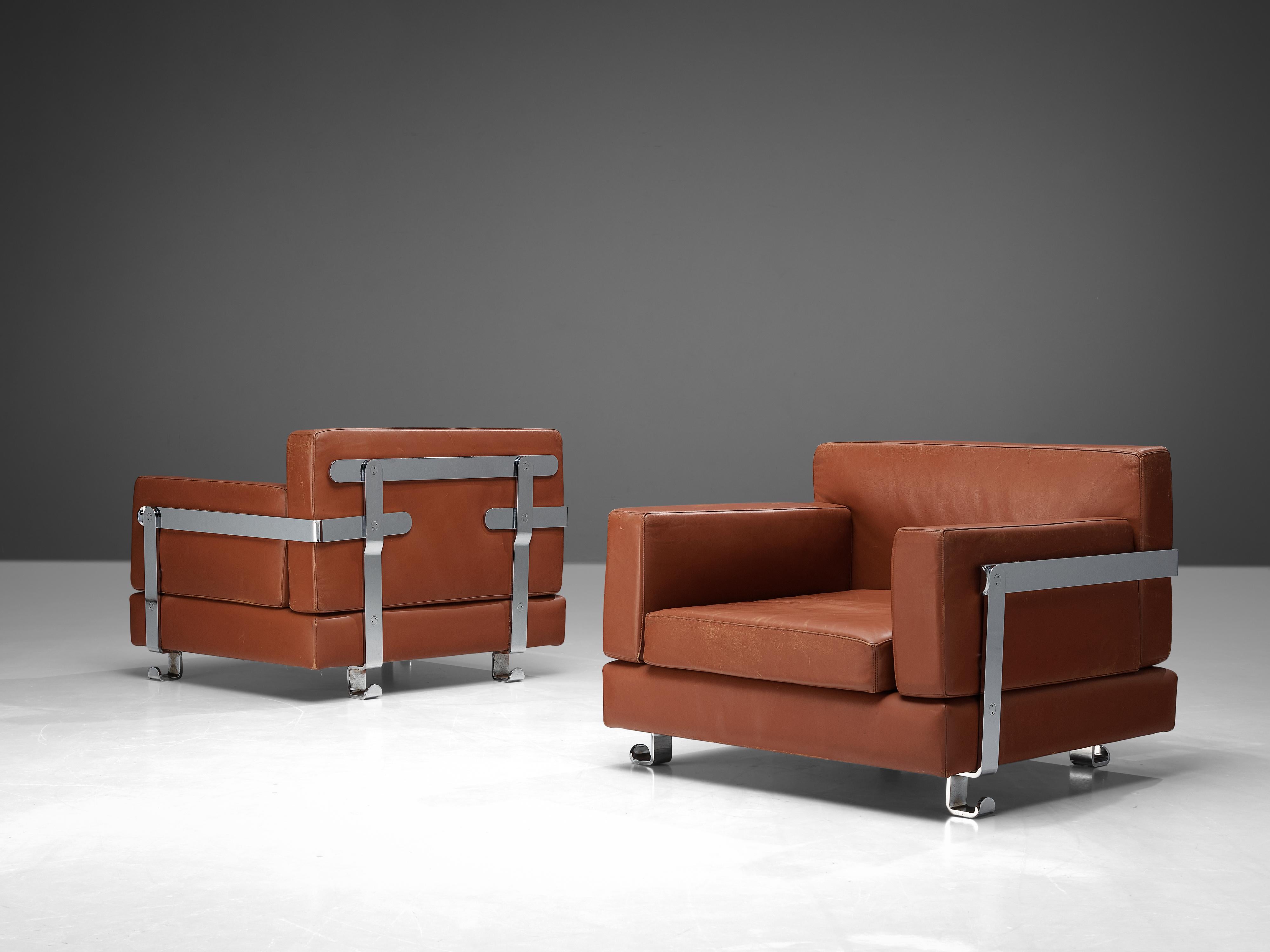 Luigi Caccia Dominioni for Azucena, pair of lounge chairs, leather, metal, Italy, 1960s 
 
This rare pair of cubist lounge chairs executed in brown leather are designed by Luigi Caccia Dominioni for Azucena. The design is characterized by