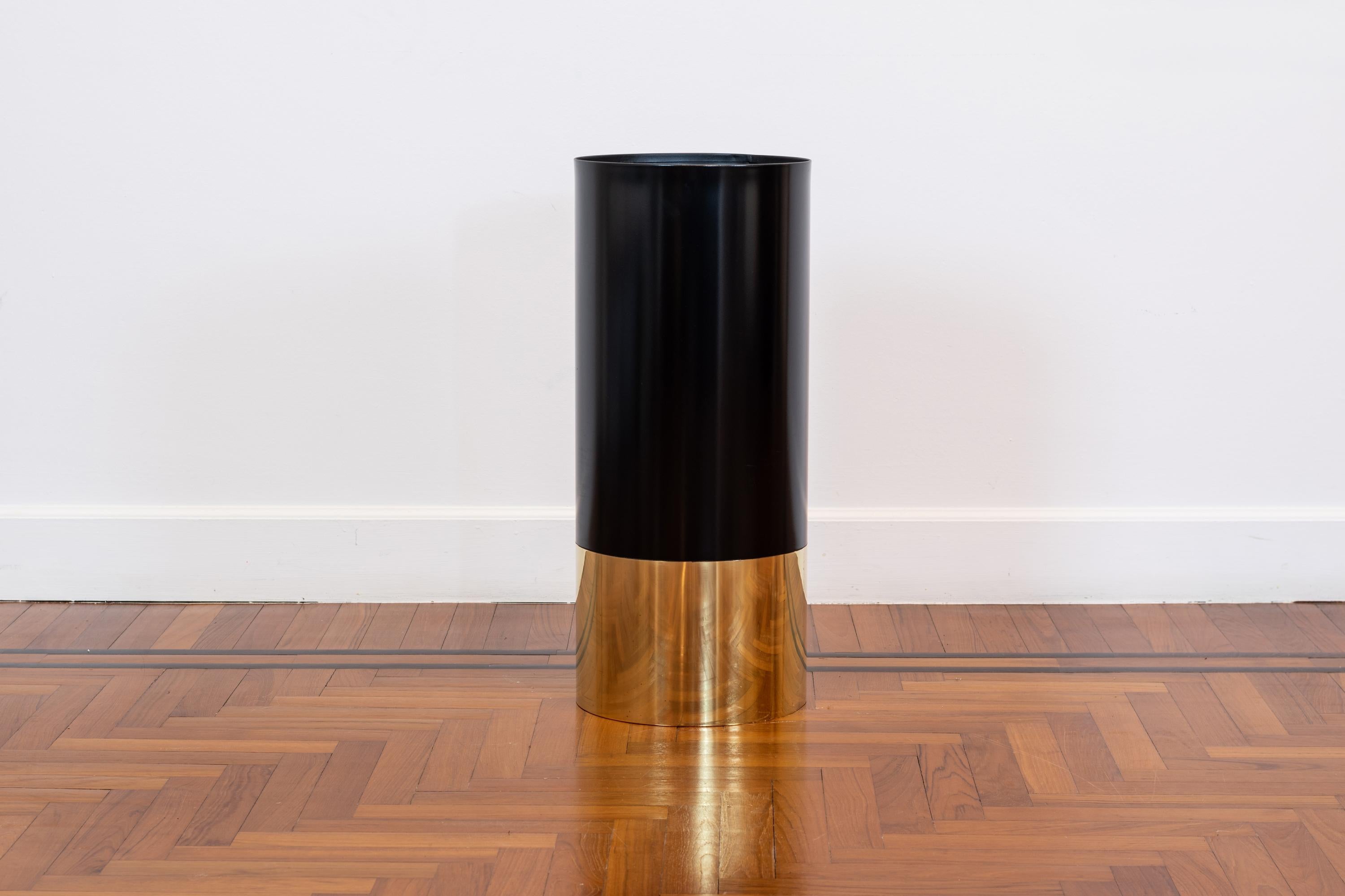 Umbrella stand model 0G13 also known as Cartuccia with a structure in black enameled sheet metal and brass. It was designed by Luigi Caccia Dominioni for Azucena 1955ca, Italy.

Luigi Caccia Dominioni was an Italian designer and architect born in