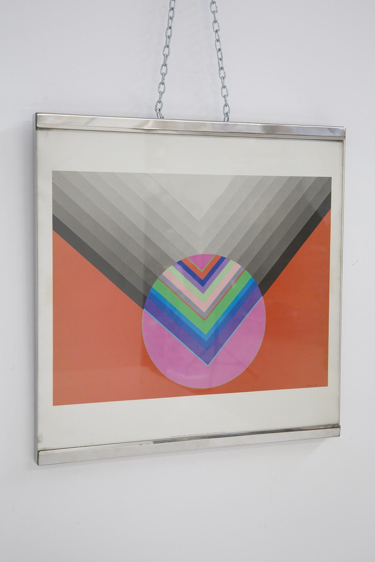 Beautiful vintage chromed steel frame made by Luigi Caccia Dominioni and Vittorio Introini in the '70s for the Vips Residence. The frame has a square shape and is made entirely of chromed steel.
The painting by Luigi Caccia Dominioni depicts a